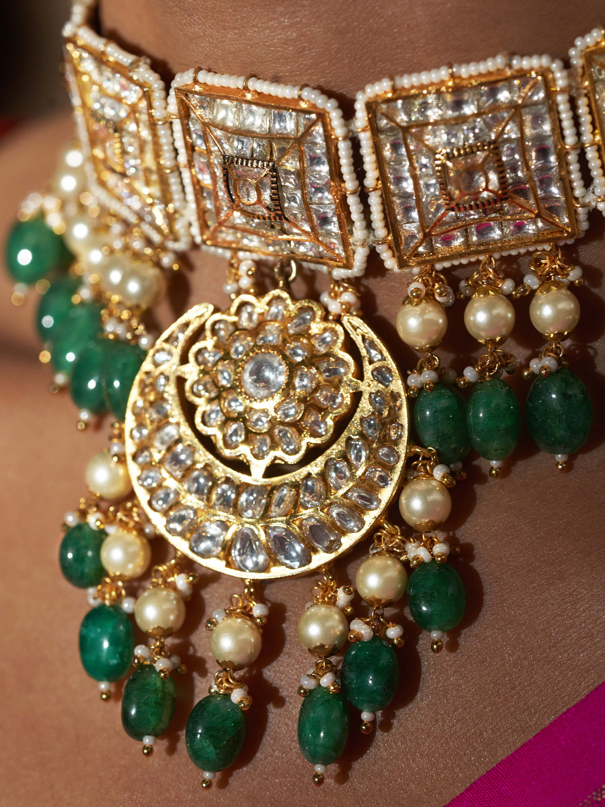 Overhead view of Bandhel Metal Collar Necklace featuring the detailed design and elegant collar shape.