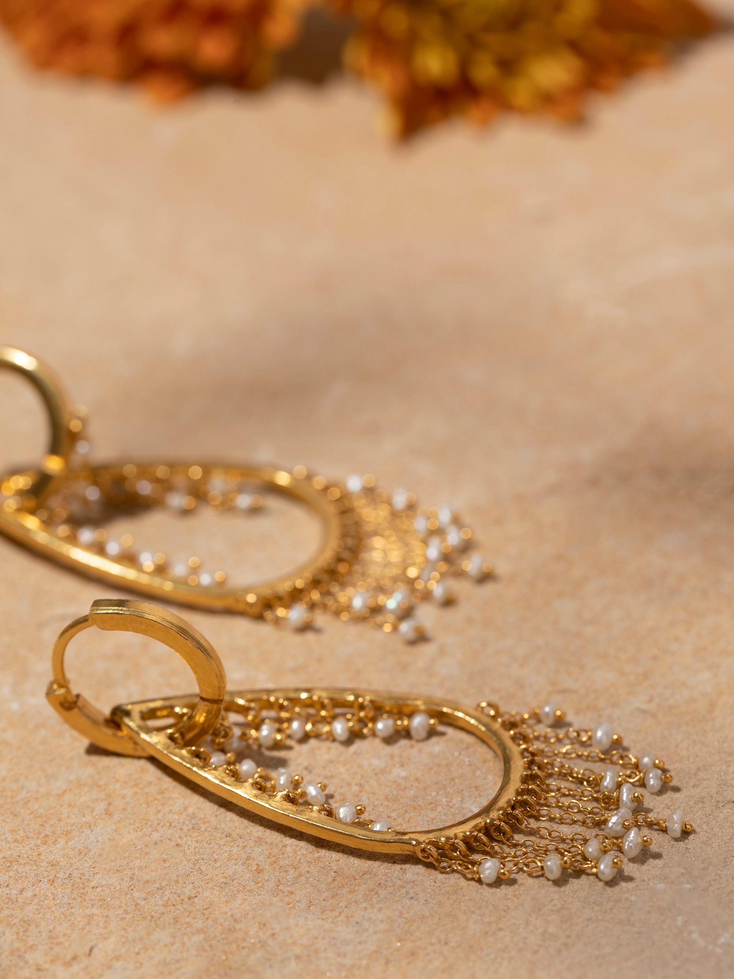 Side view of Silver Flame Glass Long Necklace highlighting detailed glass work.