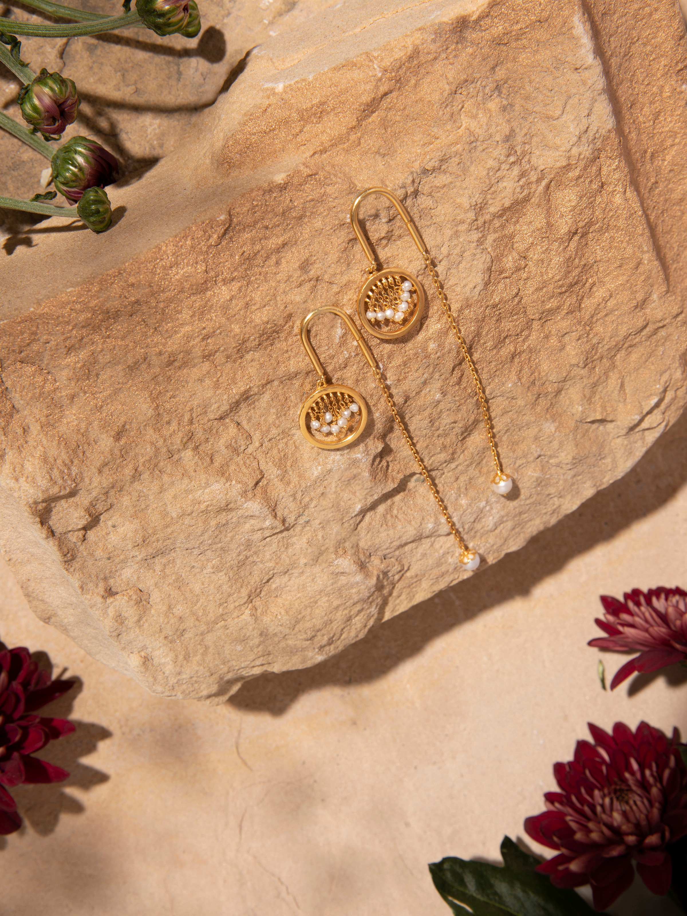 Side view of Silver Smithing Threader Earrings showing elegant drop and sleek, thin design.