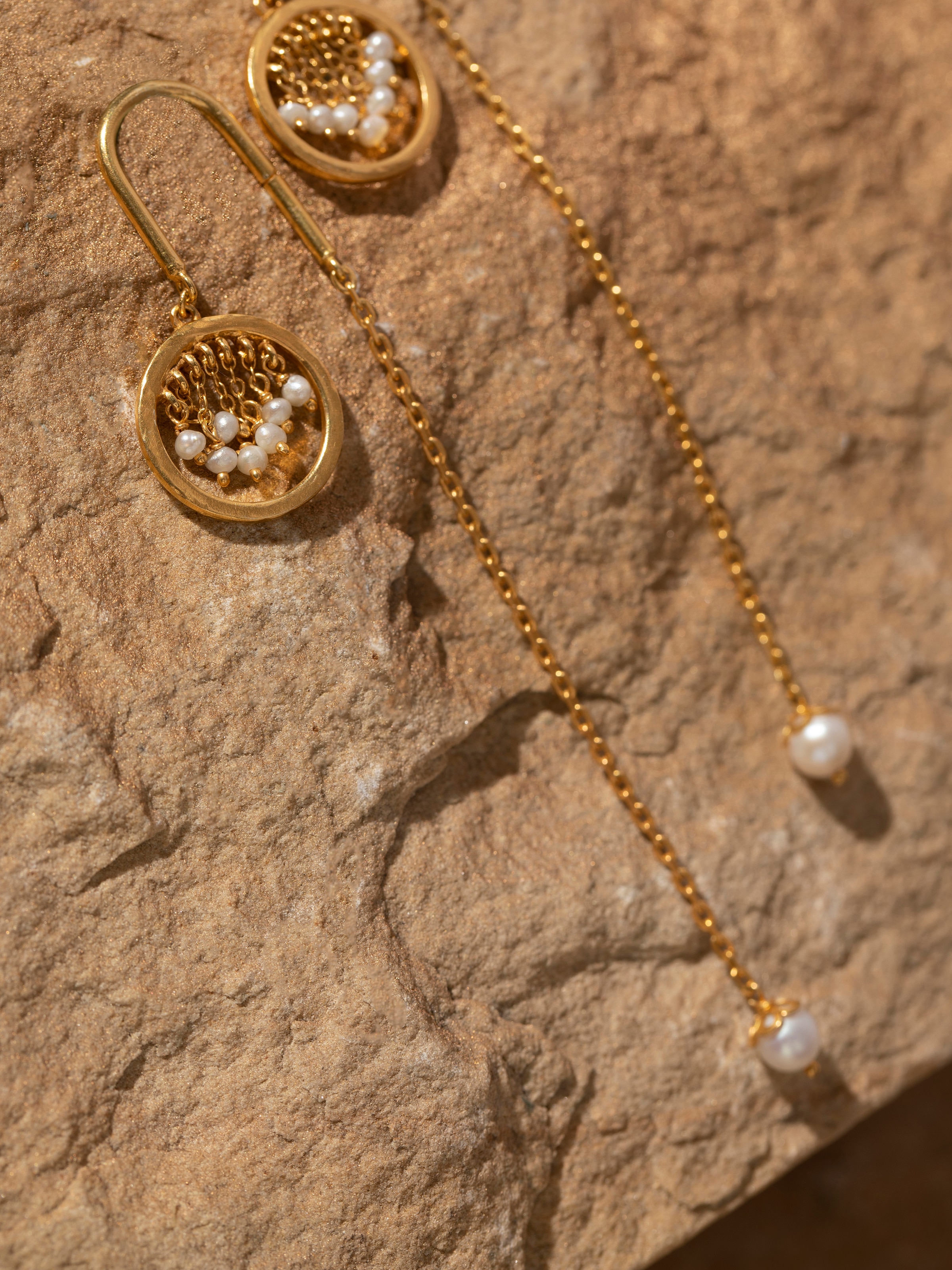 Detailed view of Silver Smithing Threader Earrings showcasing fine metalwork and elegant design.