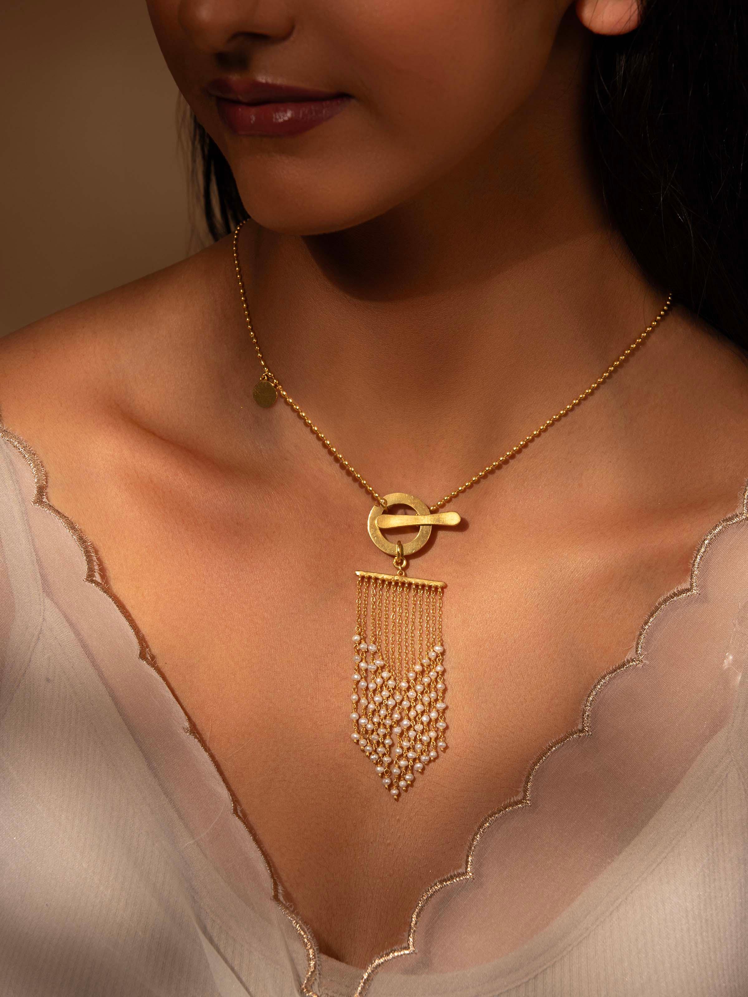 Close-up view of Silver Smithing Collar Necklace highlighting detailed silver designs.