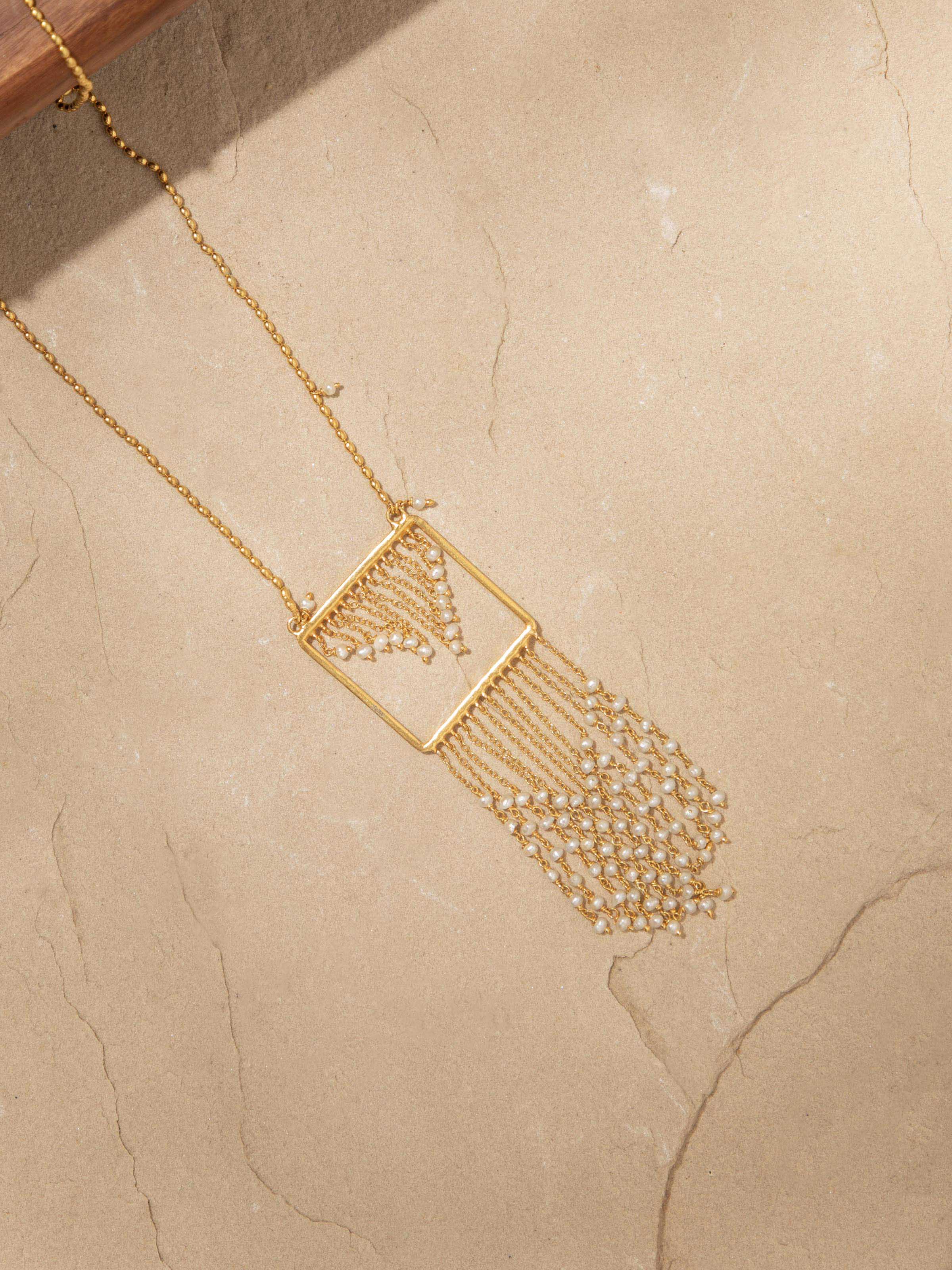 Side view of Silver Smithing Long Necklace showcasing its refined design and craftsmanship.