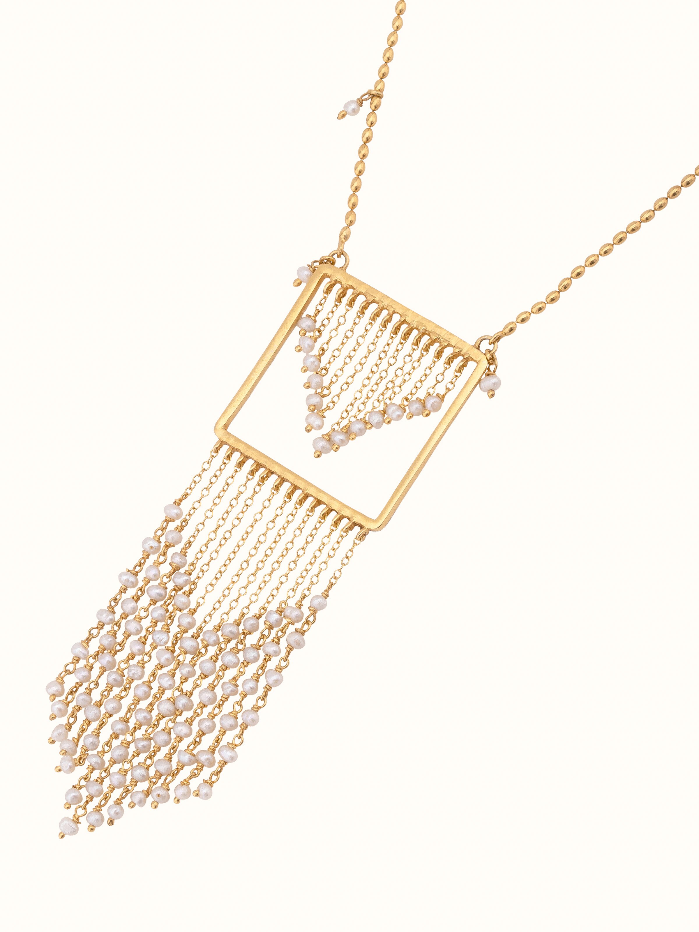 Angled view of Silver Smithing Long Necklace emphasizing its detailed silverwork and style.