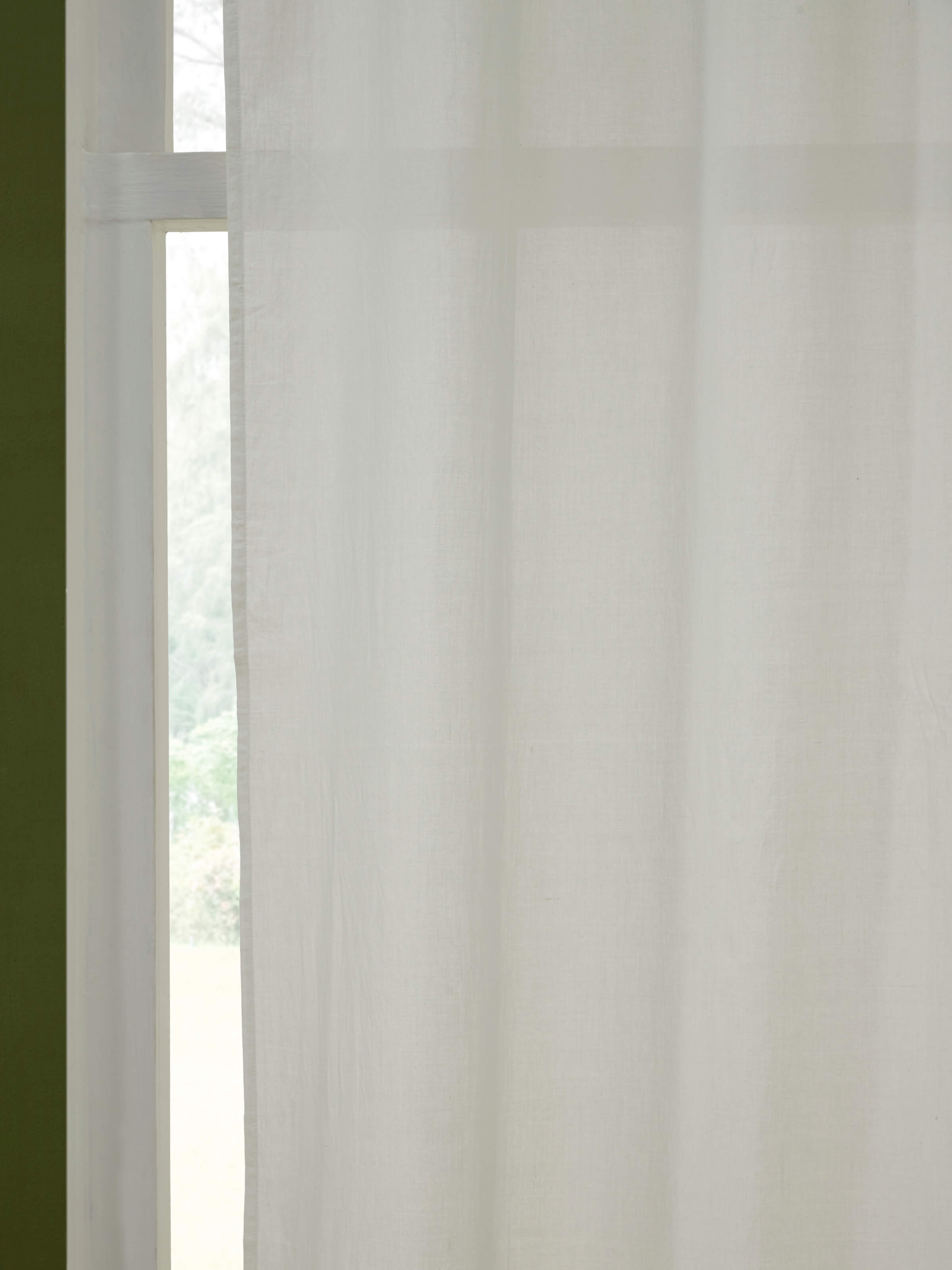 Full view of ivory solid handloom cotton curtain (7 ft) with focus on its elegant drape and solid color.