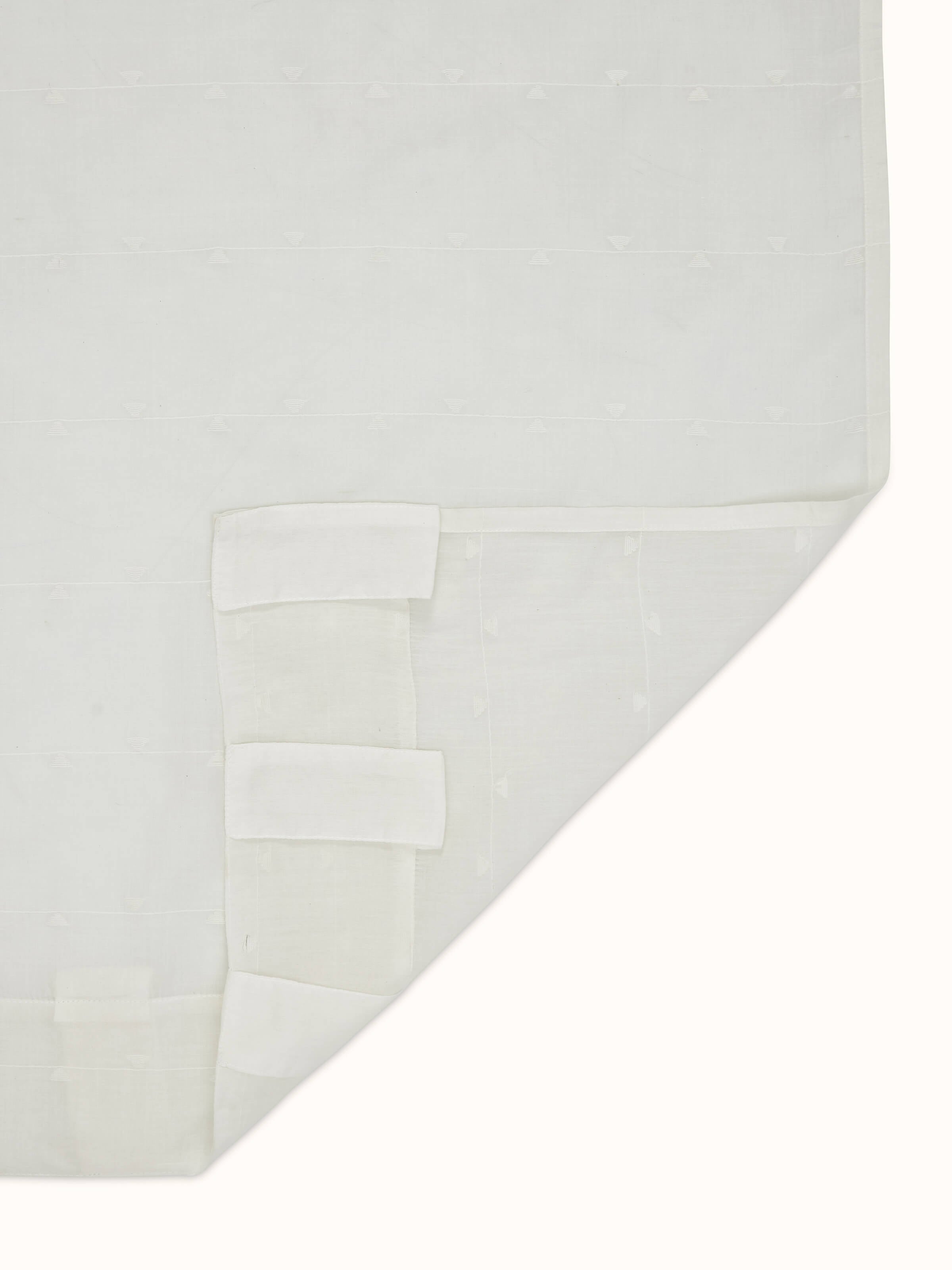 Full view of Kalpanama white woven buti handloom cotton curtain in a room setting