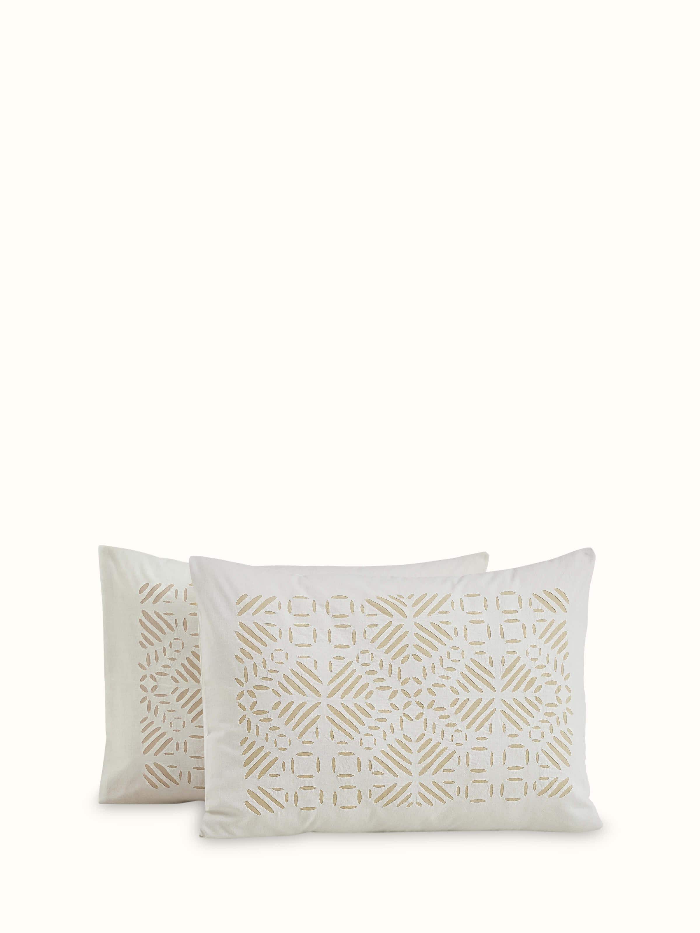 Close-up of Jharokha Beige Trellis Cotton Appliqué King Bedspread Set highlighting the appliqué design and texture.