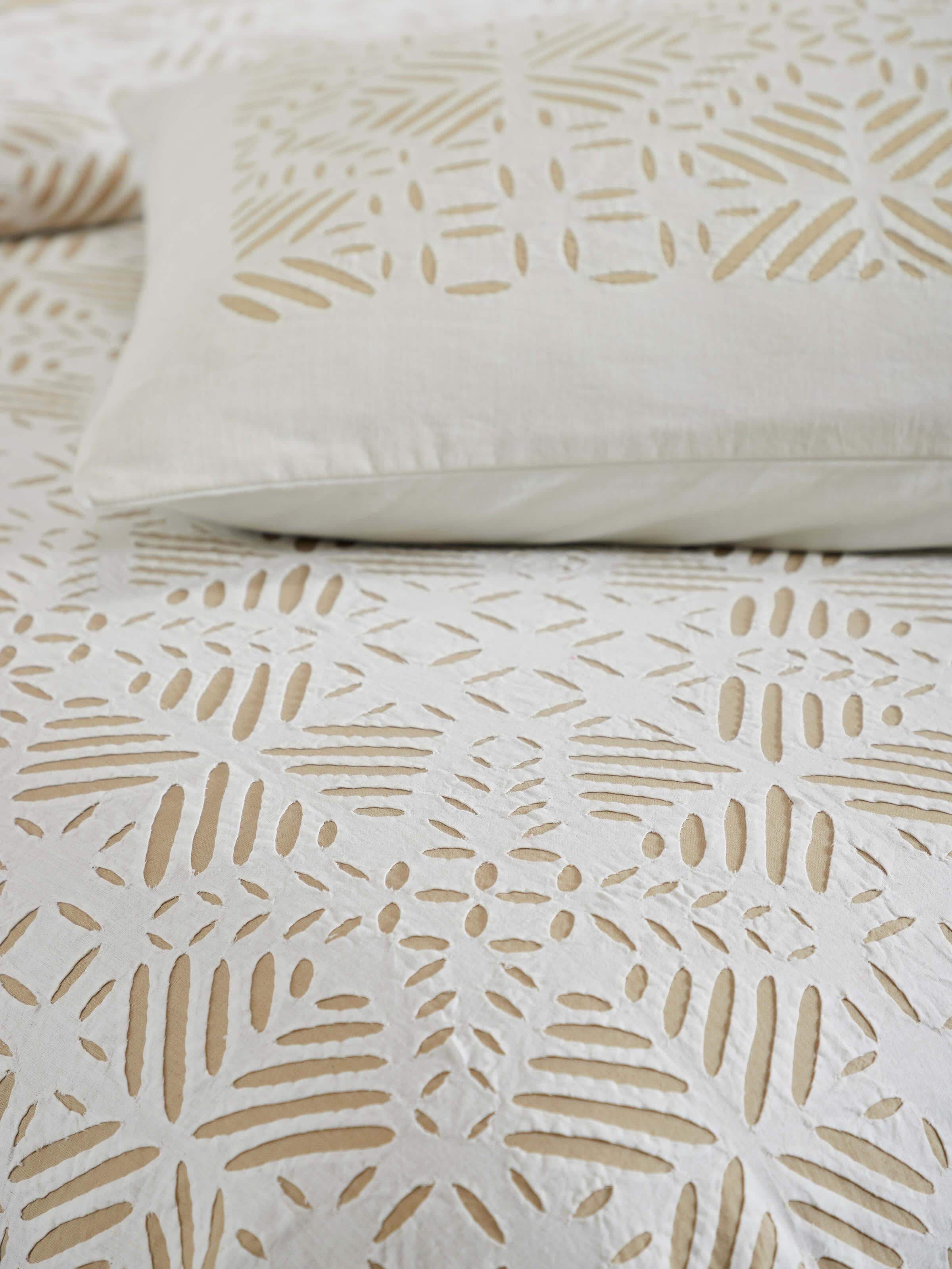 Detailed view of Jharokha Beige Trellis Cotton Appliqué King Bedspread Set showing the intricate trellis pattern.