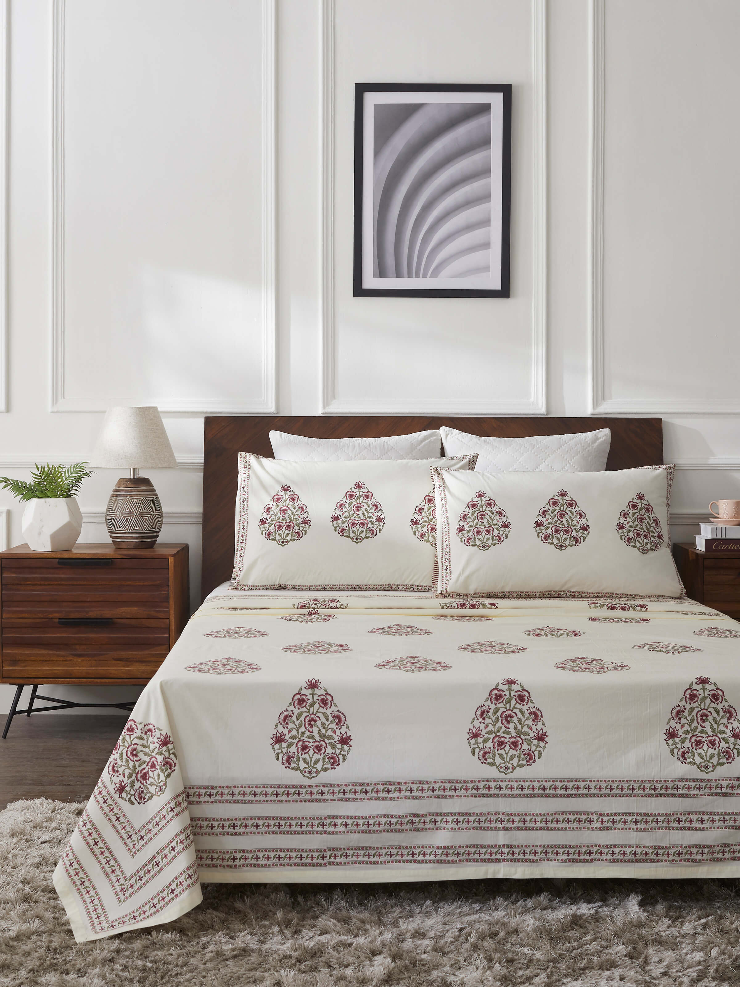 Close-up of the Aarunya red buta cotton Sanganeri block printed queen bedsheet set, highlighting the print detail.