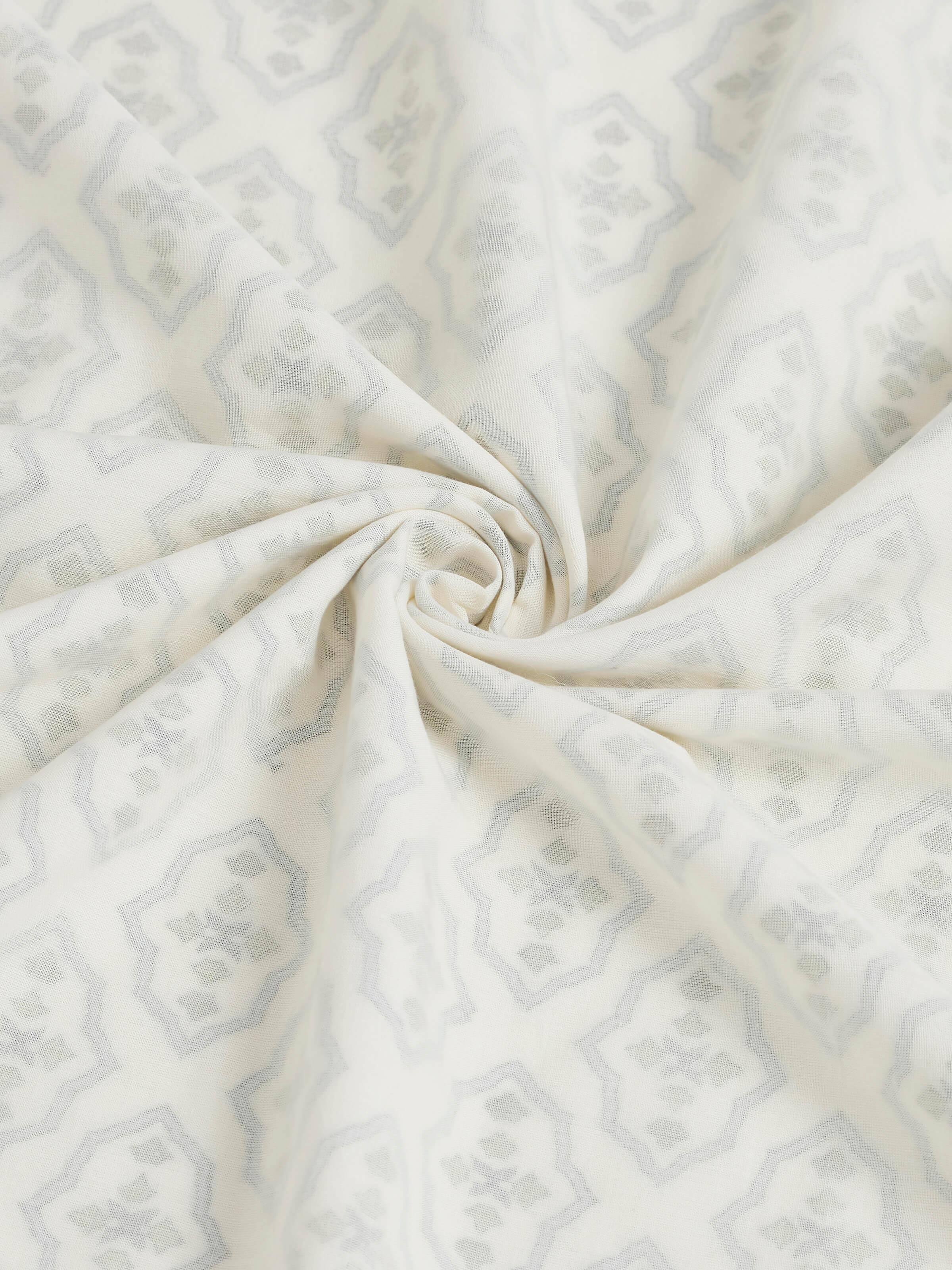 Aarunya blue trellis cotton Sanganeri block printed double dohar arranged to showcase the intricate block print design.