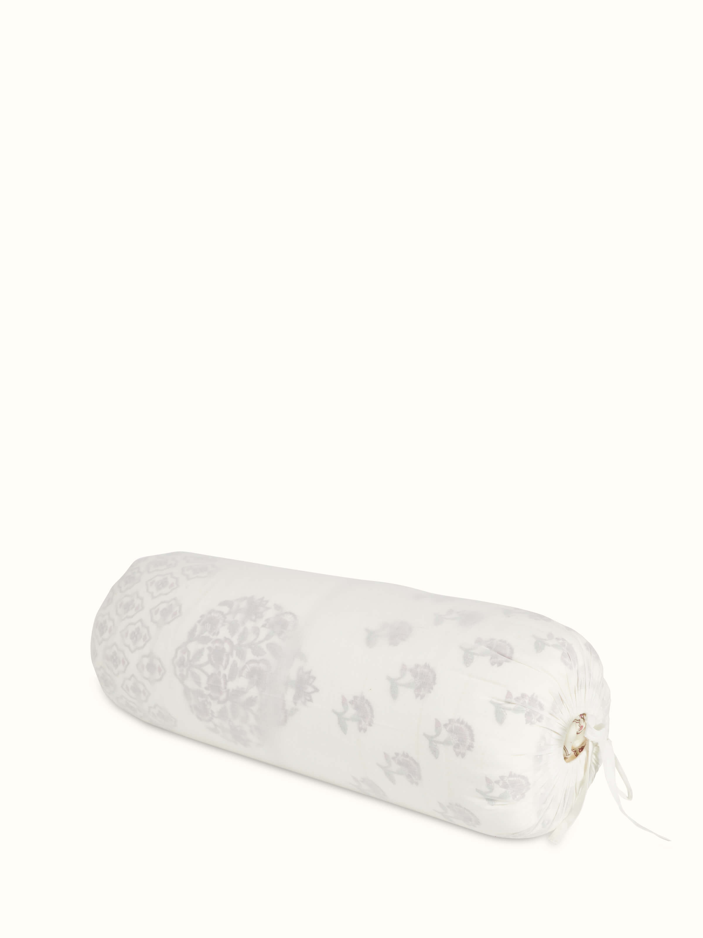 Aarunya red floral cotton Sanganeri block printed single quilt folded, showcasing its vibrant color and pattern.