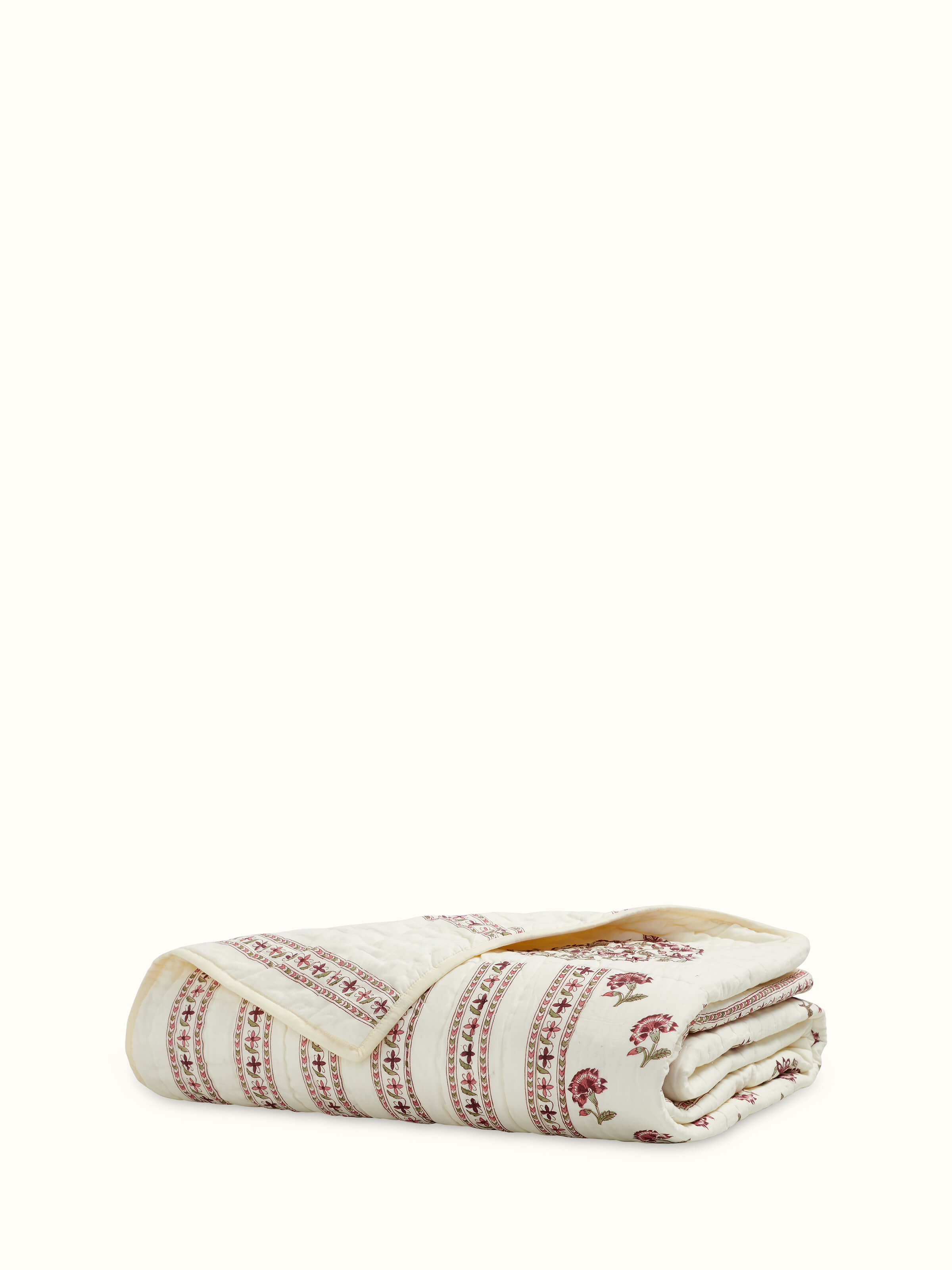 Front view of Aarunya red floral cotton Sanganeri block printed single quilt featuring vibrant floral patterns.