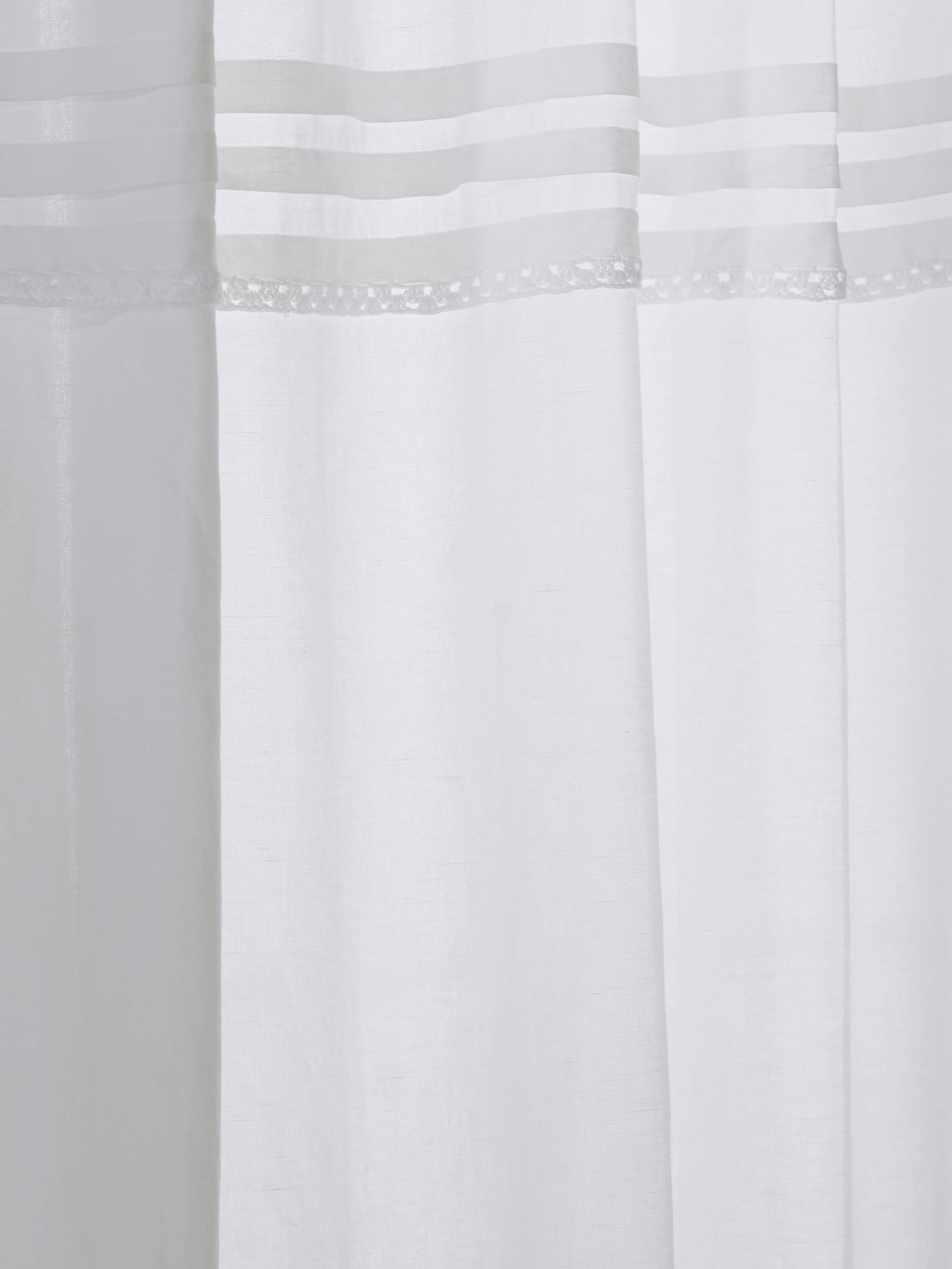 Nityam White Solid Cotton Silk Sanganeri Block Printed Sheer Curtain, featuring the curtain hanging, highlighting its sheer quality.