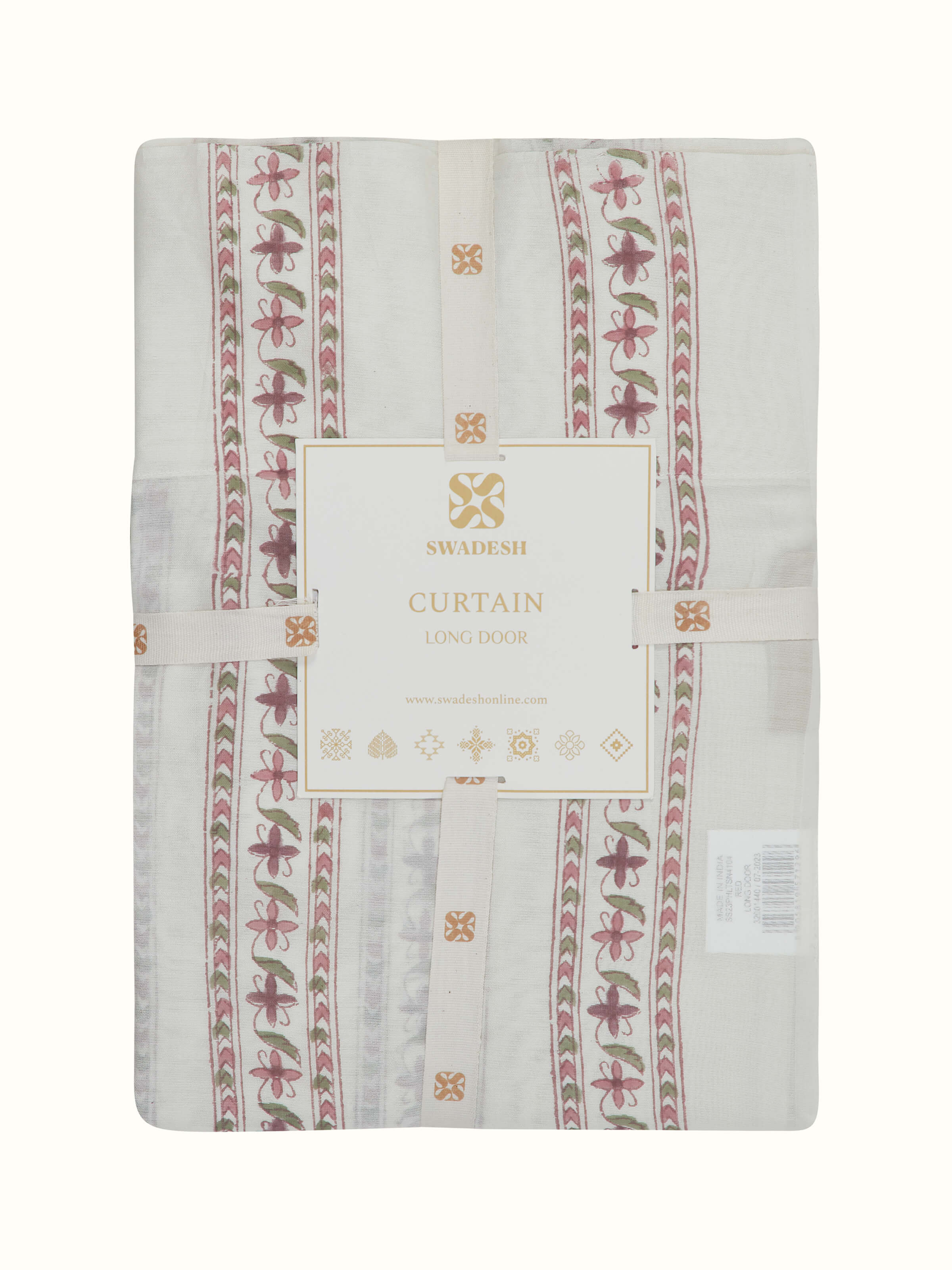 Red floral sheer curtain draped in a window, demonstrating its elegant flow and the intricate Sanganeri block print pattern.