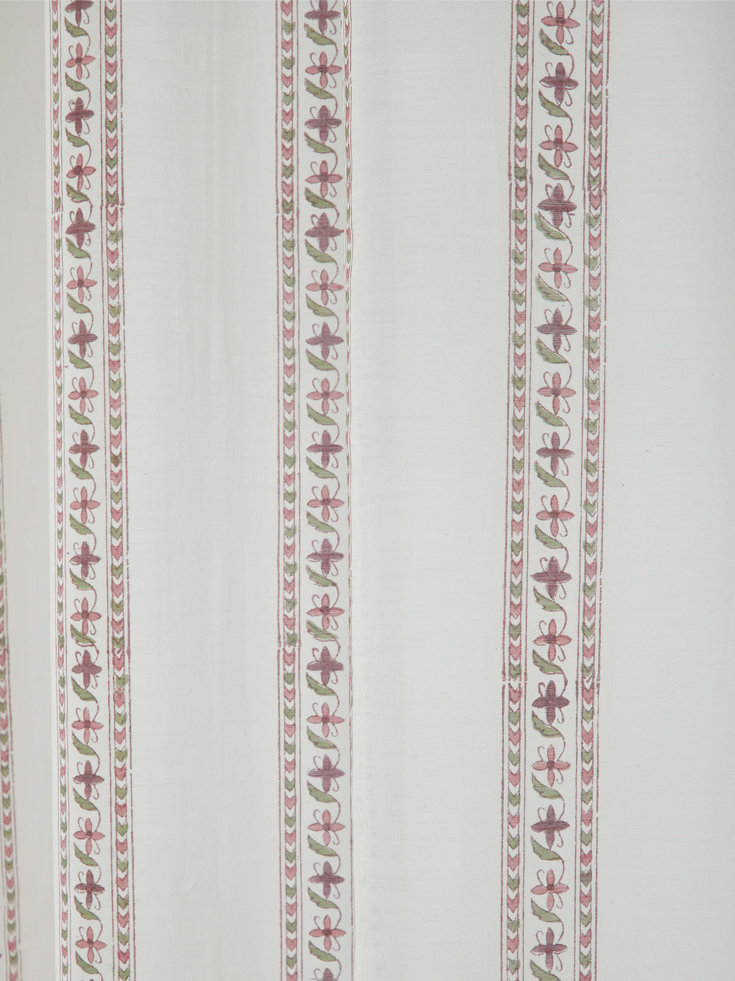 Side view of Aaarunya Red Floral Border Cotton Silk Sanganeri Block Printed Sheer Curtain displaying the curtain’s texture and pattern.