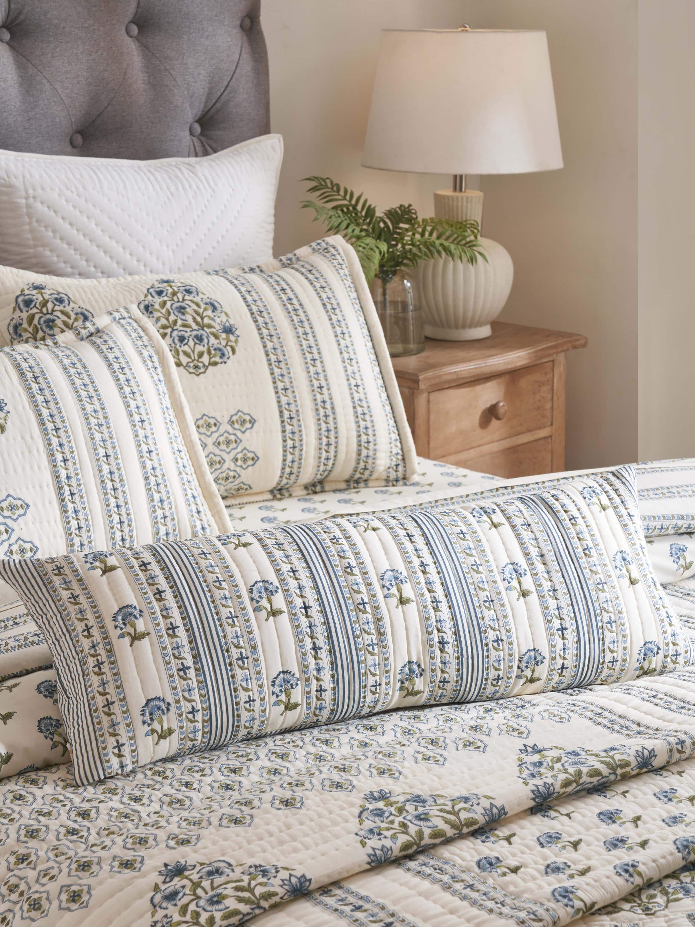 Close-up of Aaarunya blue floral cotton Sanganeri block printed cushion cover, showing detailed block print pattern and texture