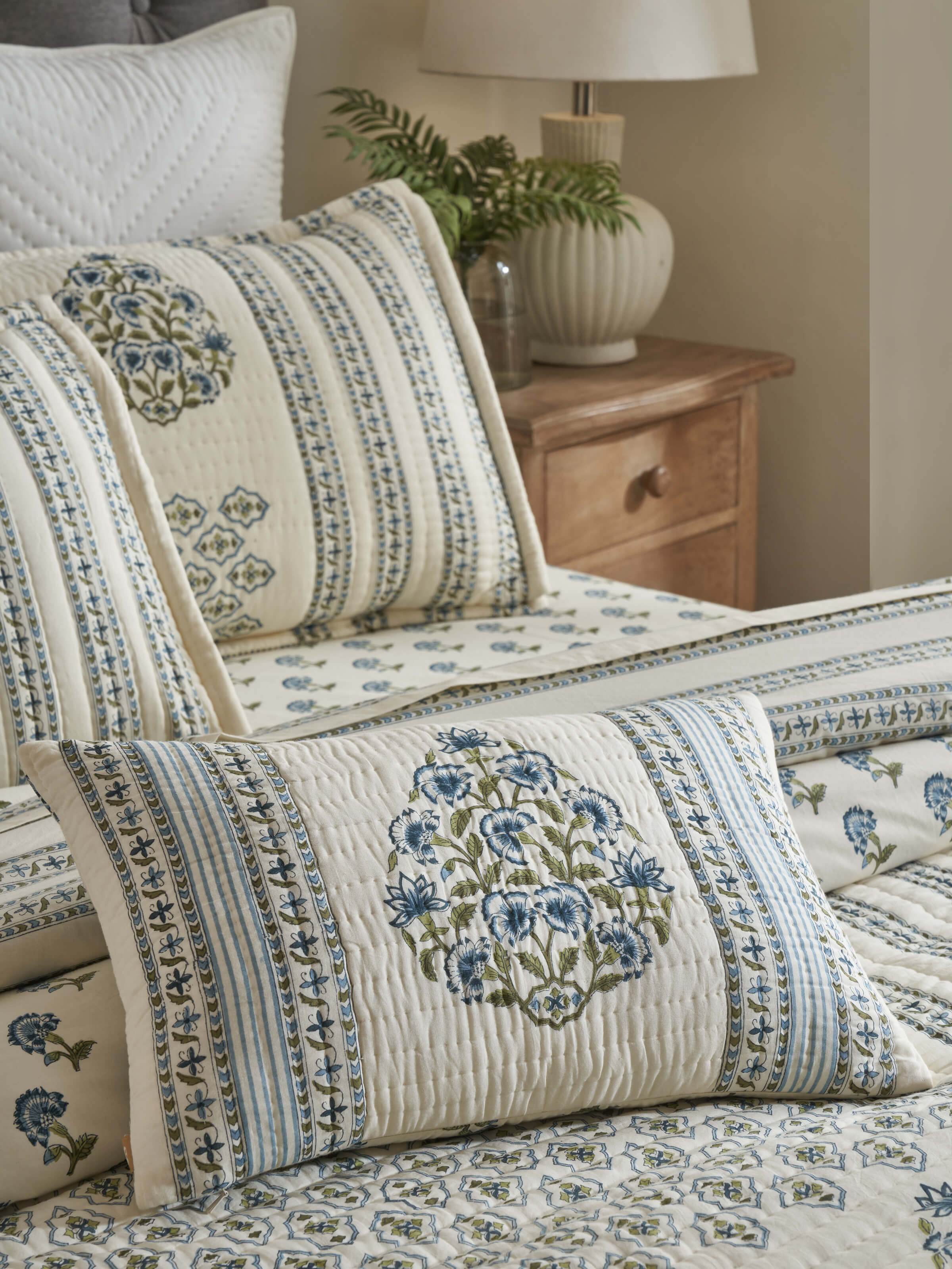 Close-up of the Aarunya blue buta cotton cushion cover showcasing the detailed Sanganeri block print patterns