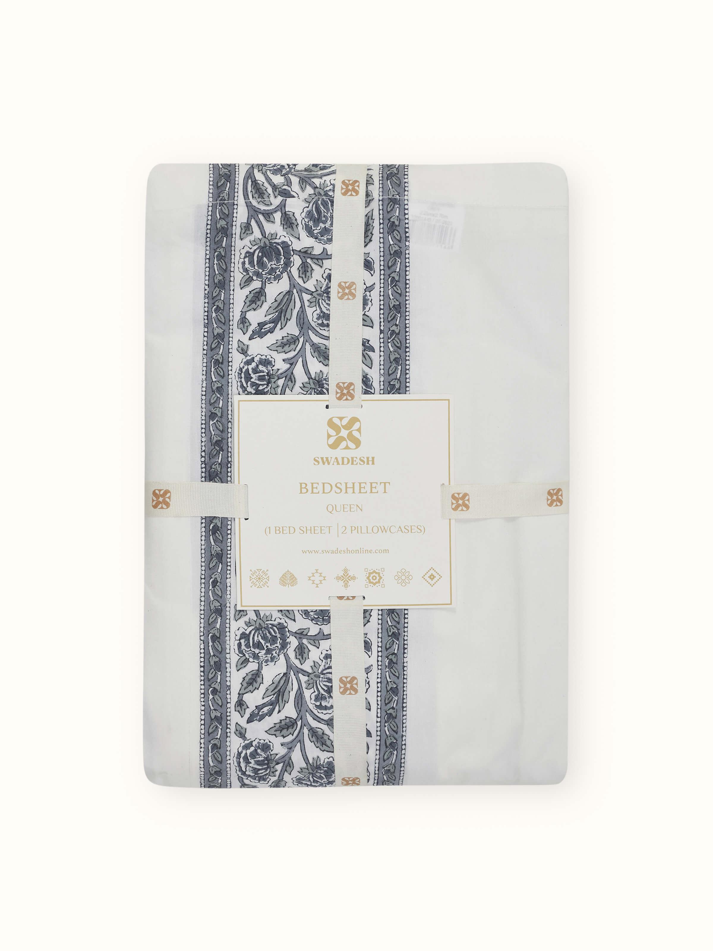 Top view of Saha grey floral cotton Sanganeri block printed queen bedsheet set showing the full layout and pattern of the bedsheet and pillow covers