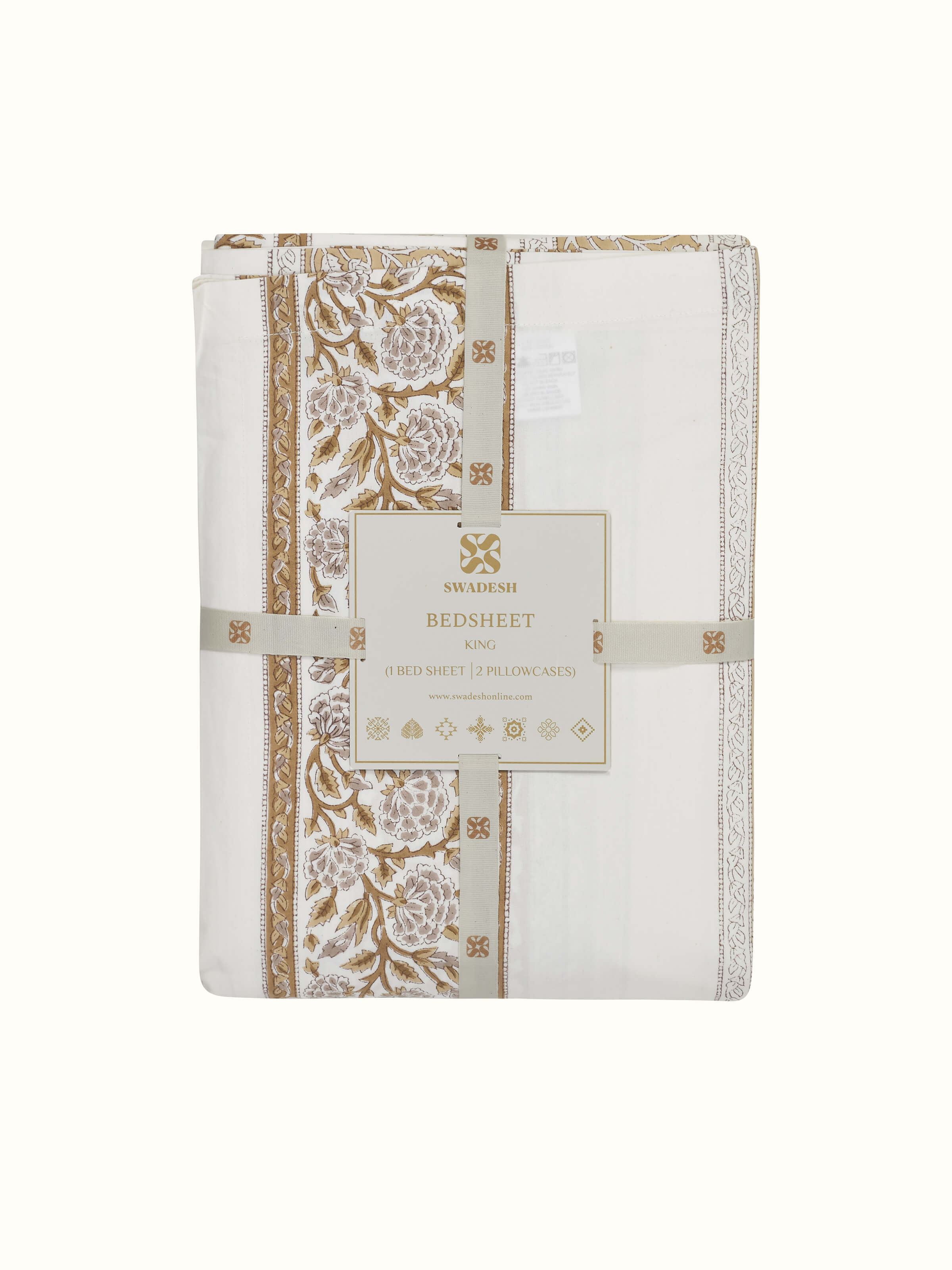 Close-up of the floral pattern on a brown Sanganeri block printed king bedsheet, capturing the fine details.