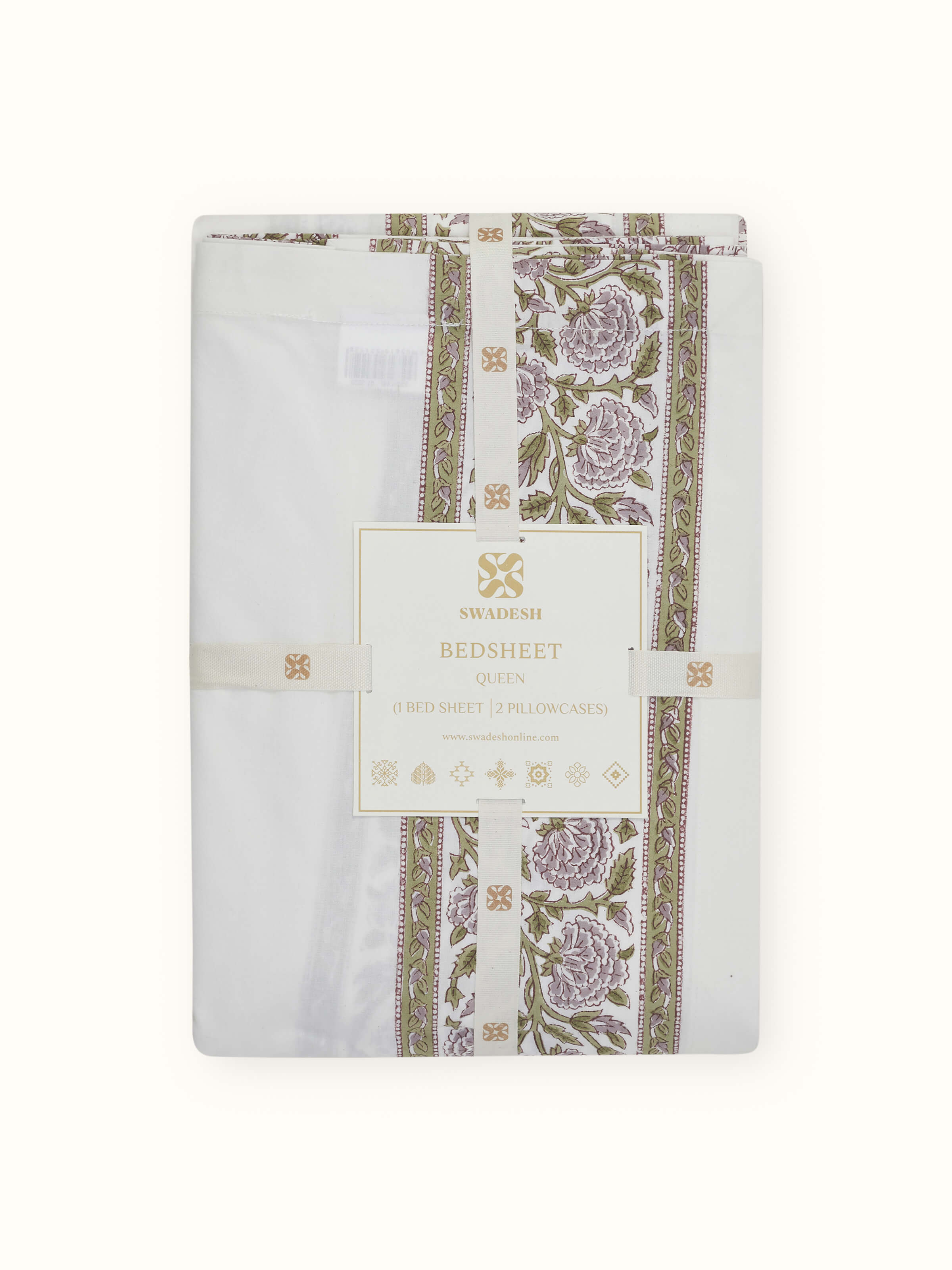 The Saha lavender floral cotton Sanganeri block printed queen bedsheet set laid out, displaying the full bedding set including pillow shams and bedsheet with a cohesive floral design.