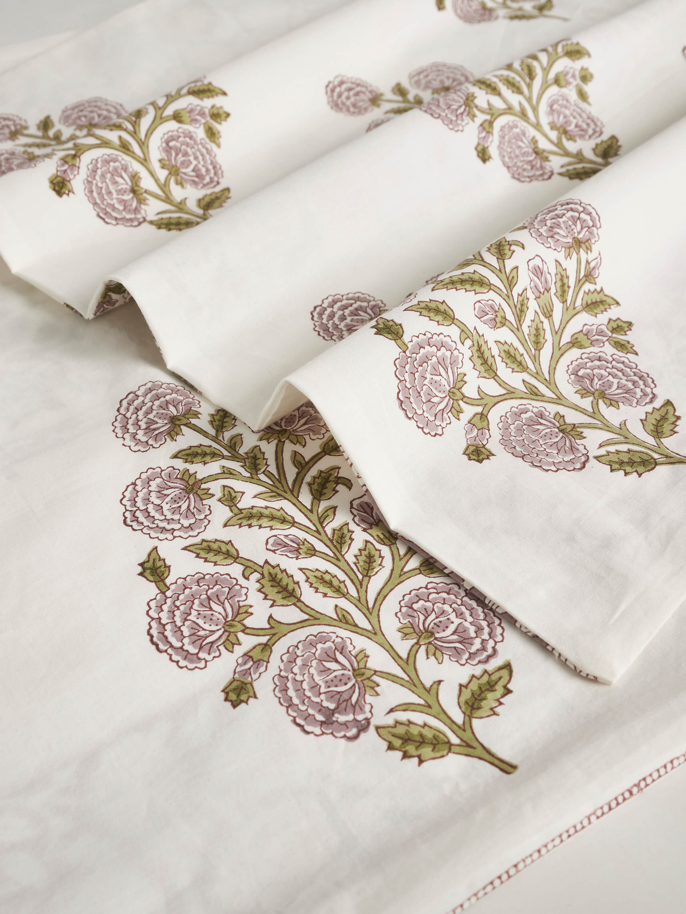 Detailed image of the Saha lavender floral cotton Sanganeri block printed queen bedsheet set, emphasizing the quality of the cotton fabric and the vibrant lavender floral pattern.