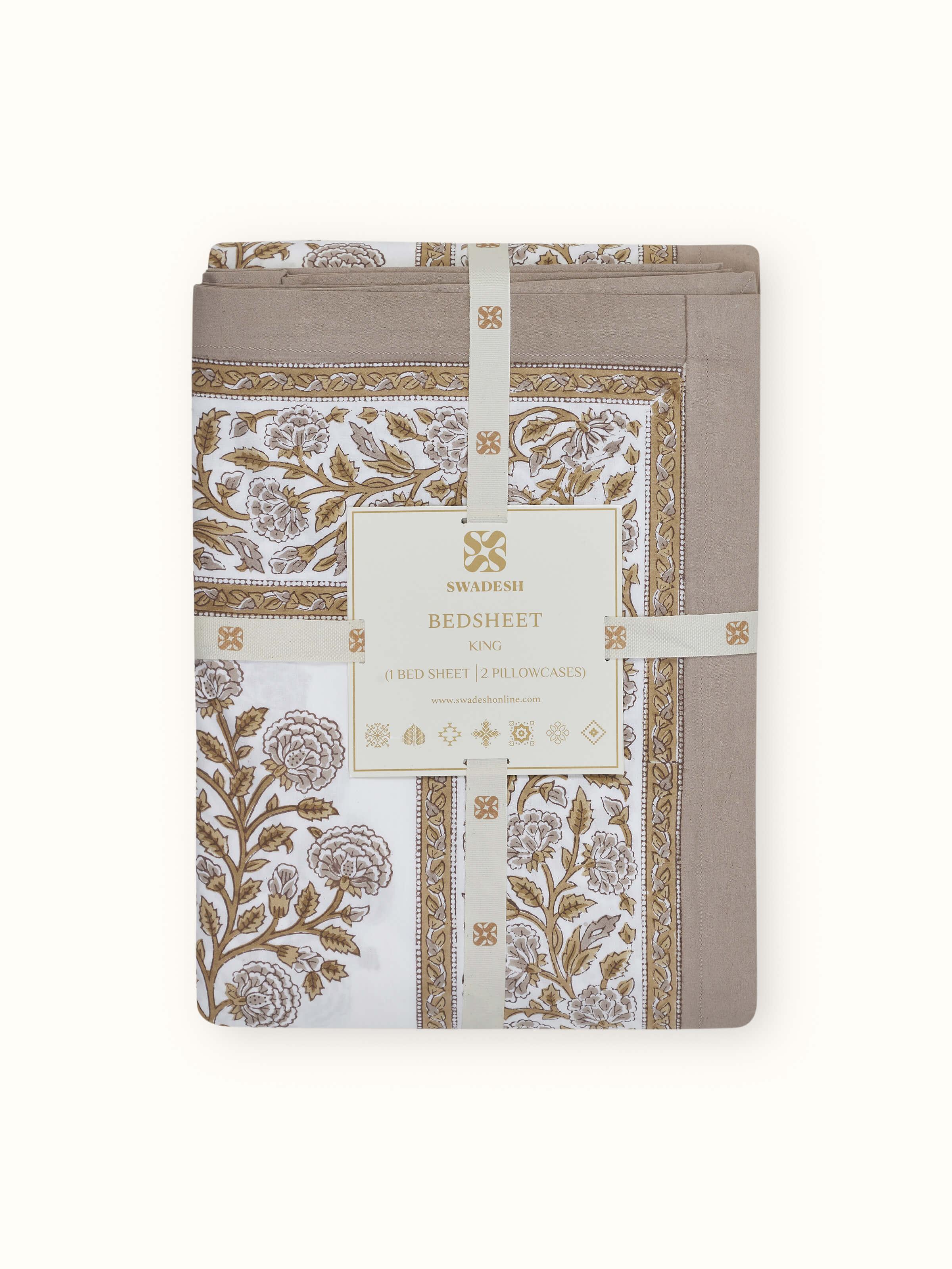 Full view of the Saha king bedsheet set arranged on a bed, displaying the complete pattern and elegant design.