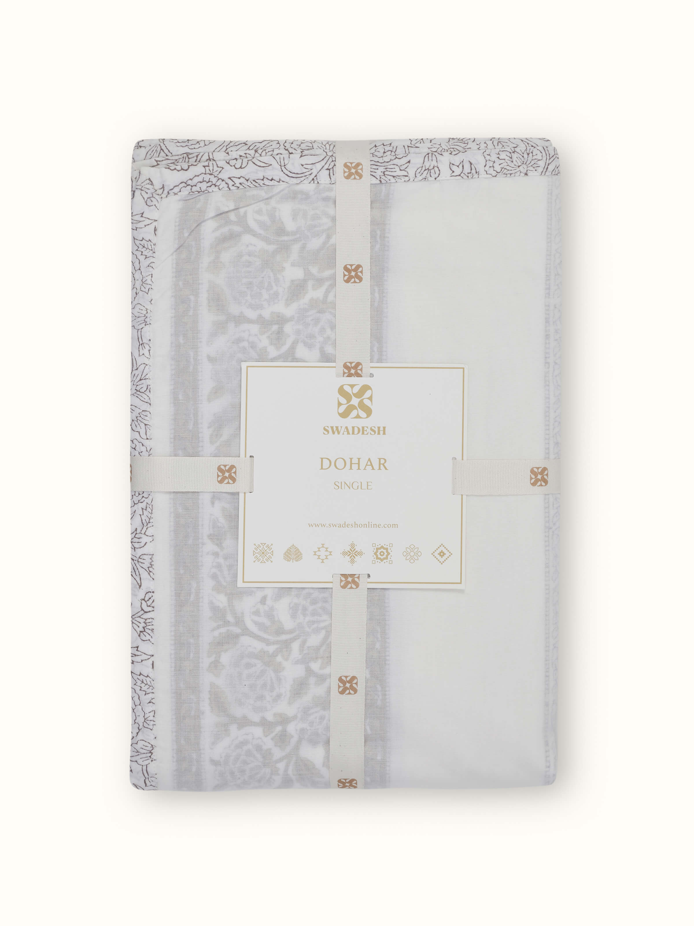 Saha brown buta stripe cotton Sanganeri block printed single dohar displayed on a bed, emphasizing its design and usage.