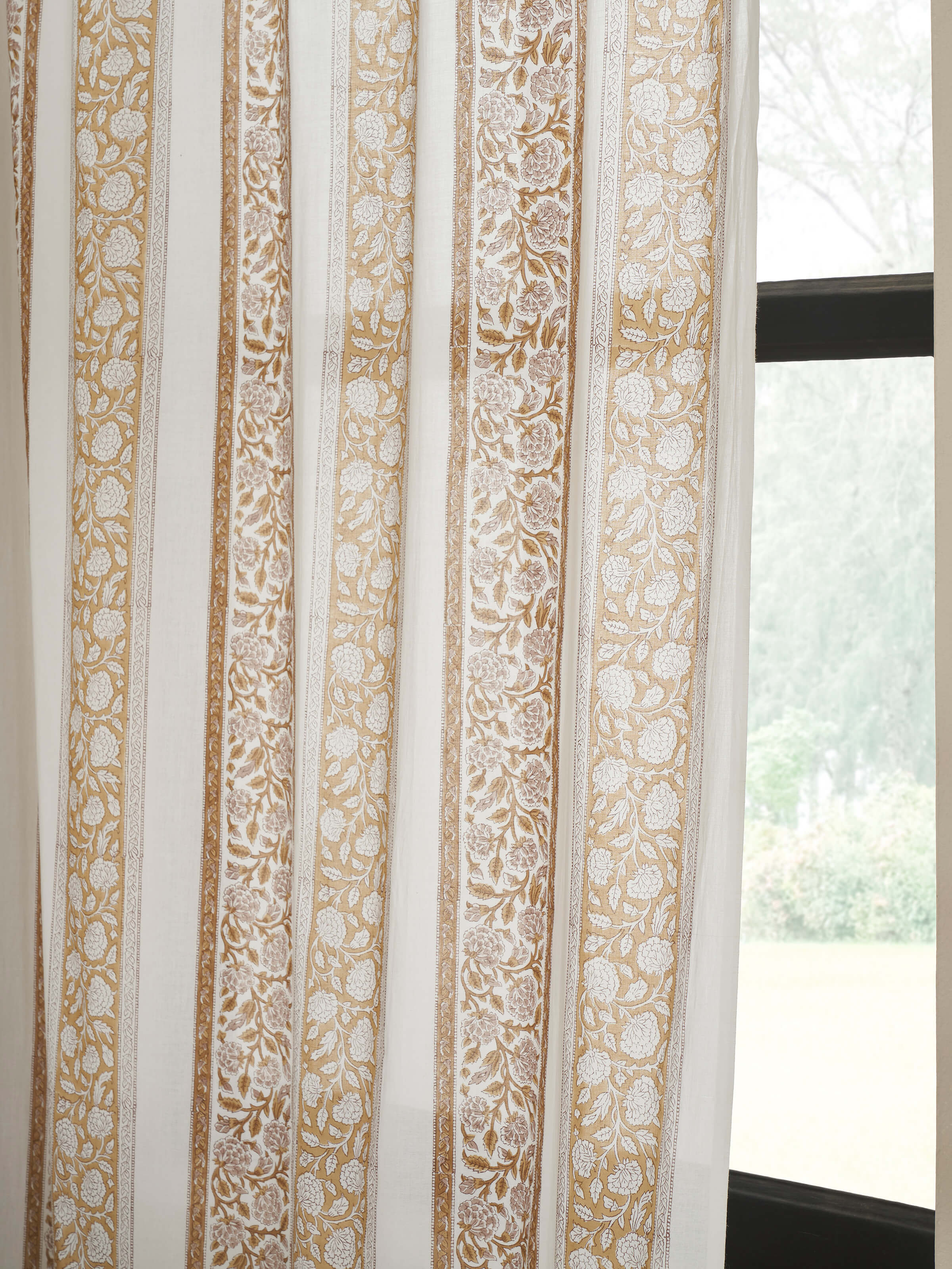 Perspective view of Saha brown floral stripe cotton Sanganeri block printed sheer curtain (9 ft) illustrating its length and design pattern.