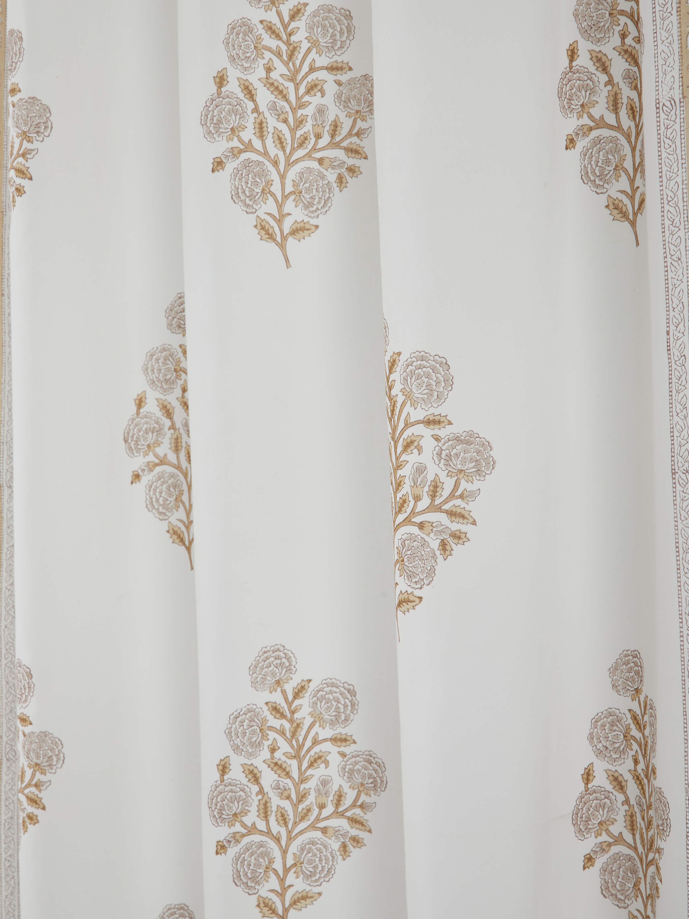 Hanging Saha brown floral buta cotton Sanganeri block printed sheer curtain revealing its full length and block print design