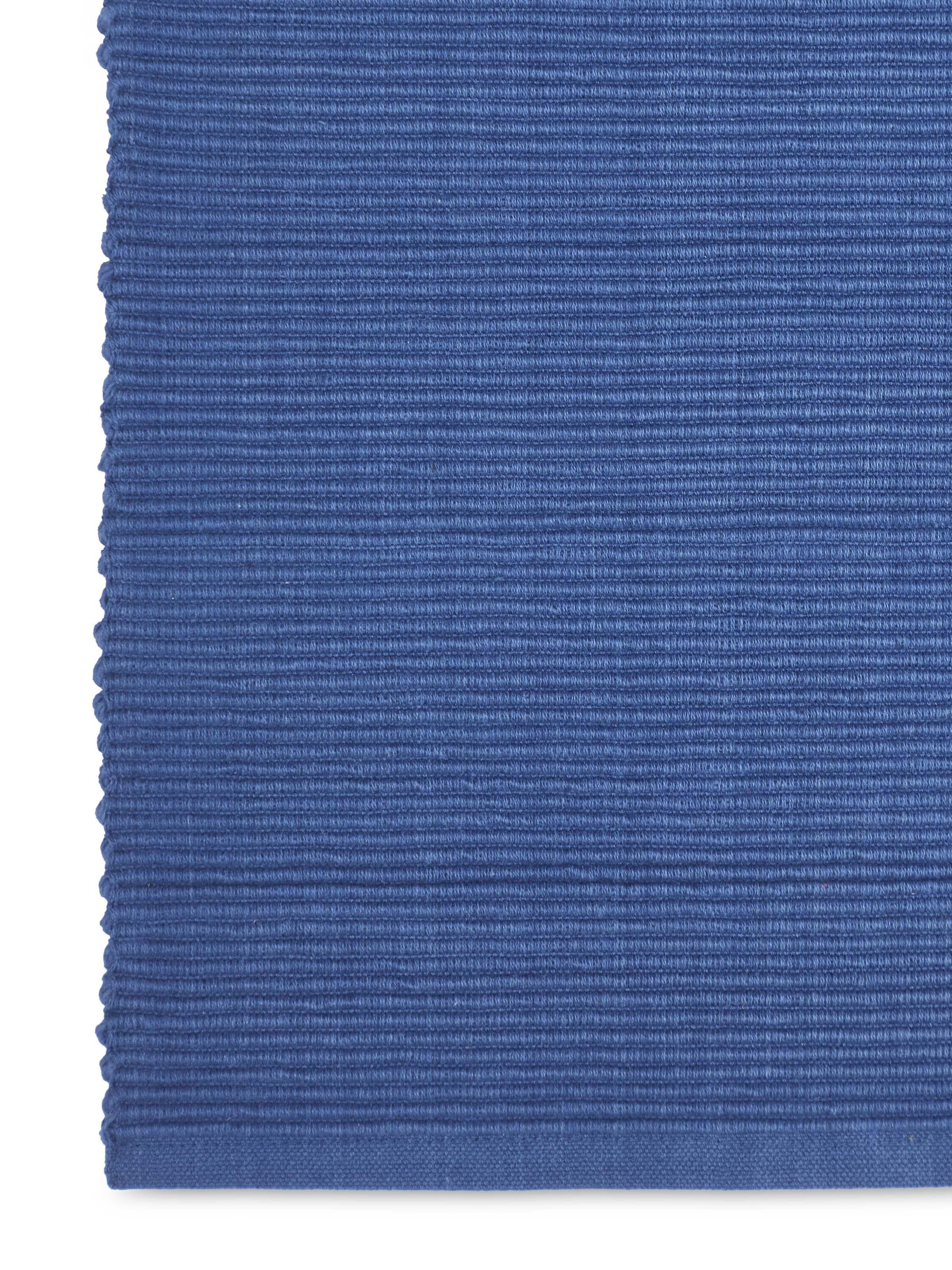 Close-up showing fine cotton texture and deep indigo hue of handloom runner.