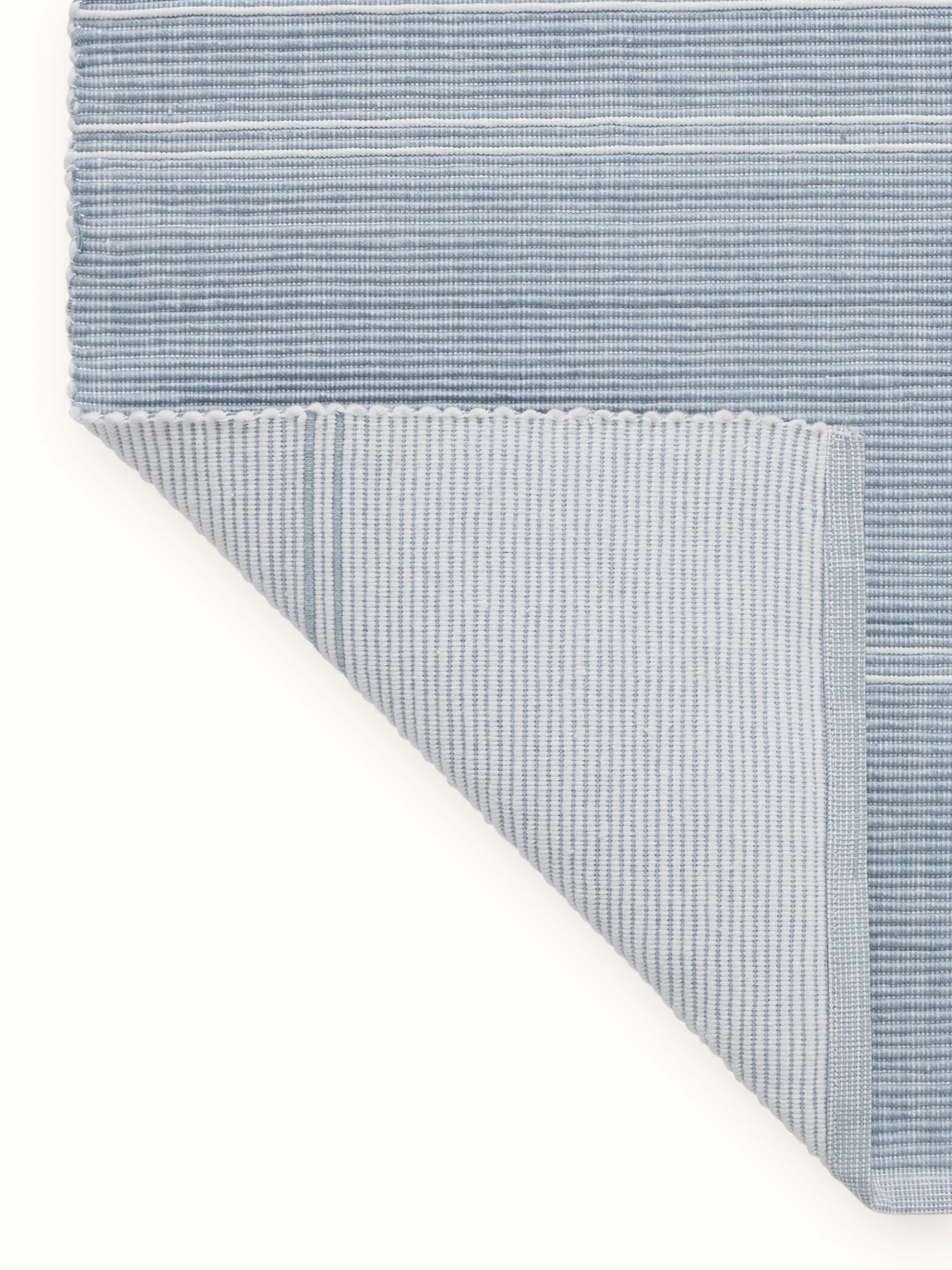 Back view: Back view of handloom cotton table runner showing fine finish and natural texture.