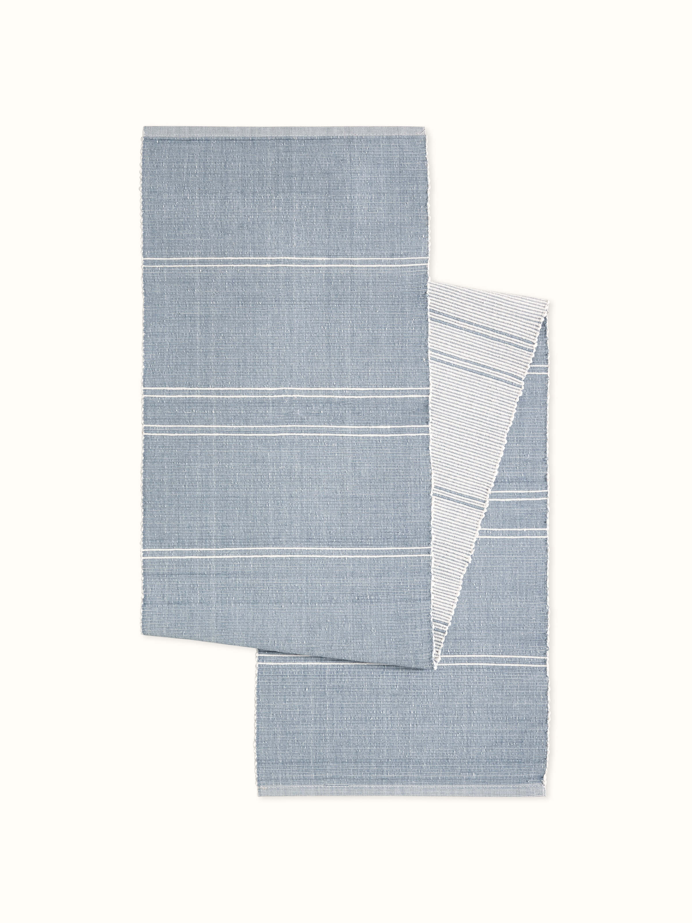 Full view of Vastav Light Blue Stripe Cotton Handloom Table Runner, featuring its striped pattern and elegant table styling.