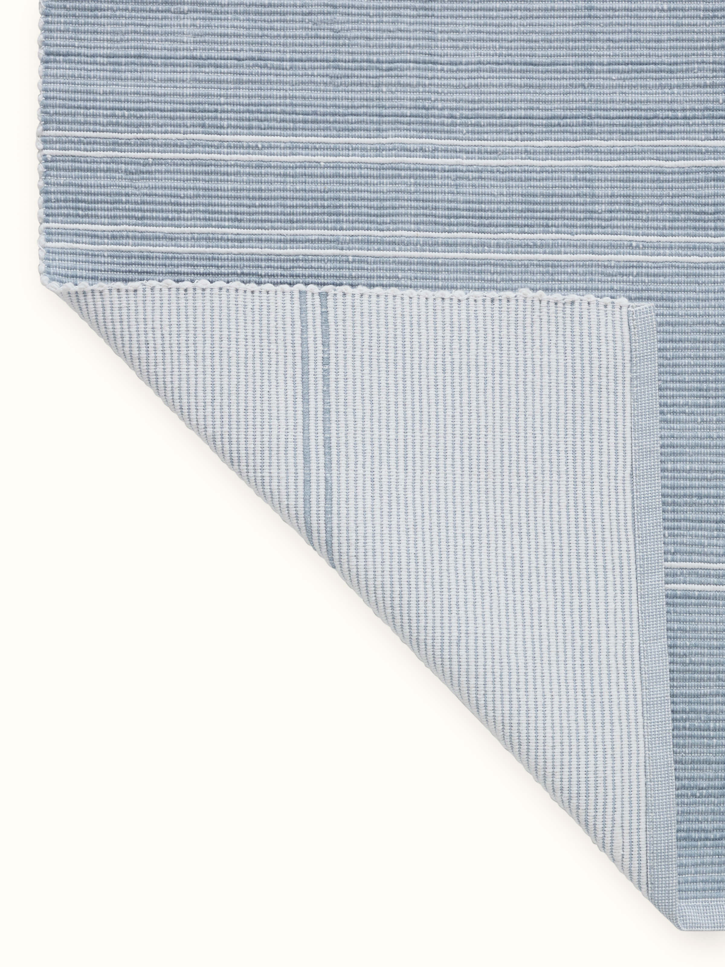 Back view of Vastav Light Blue Stripe Cotton Handloom Table Runner, showing the stitching and finish quality.
