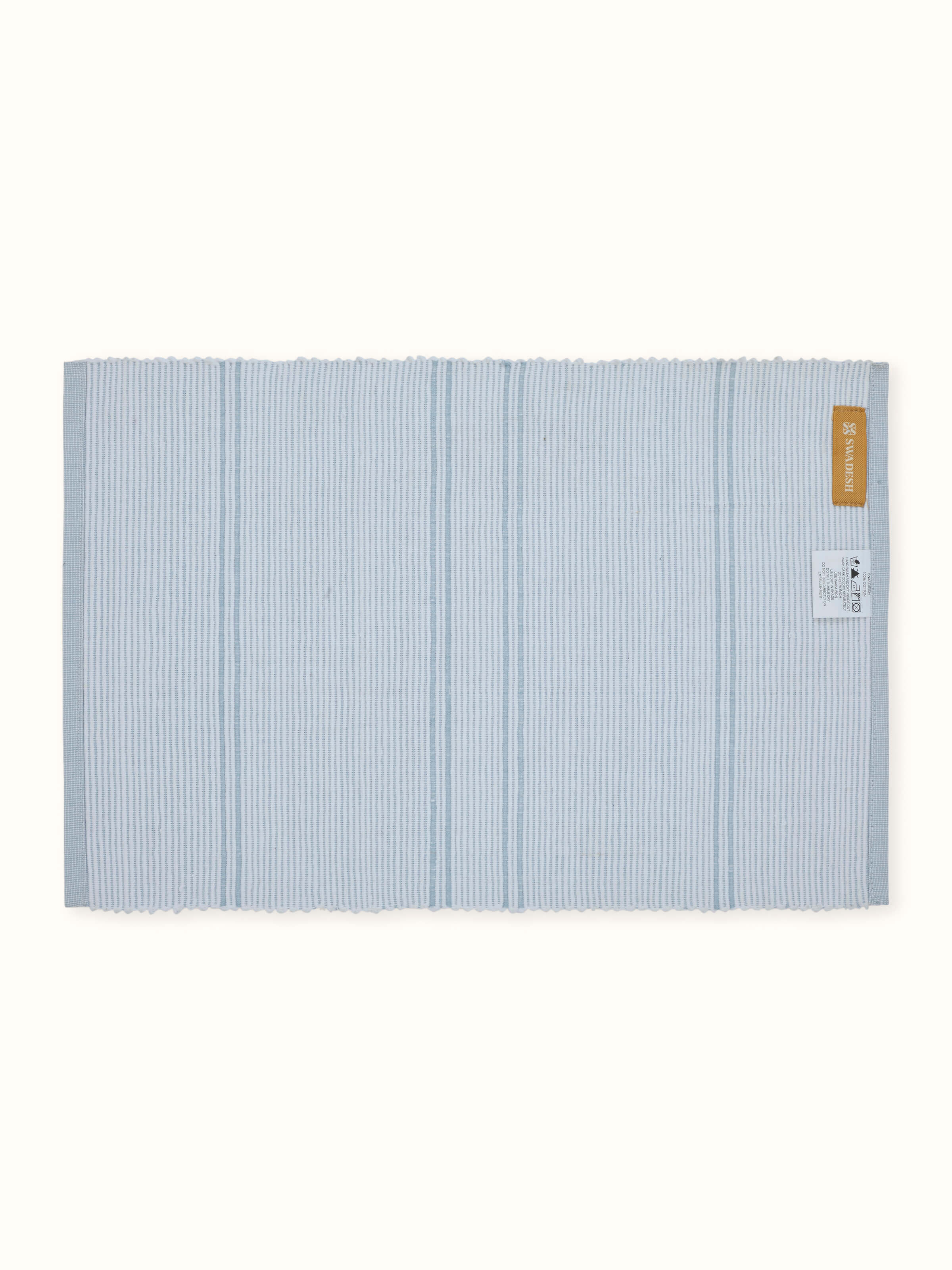 Back view of Arth Light Blue Table Mat set highlighting stitch quality and cotton fabric