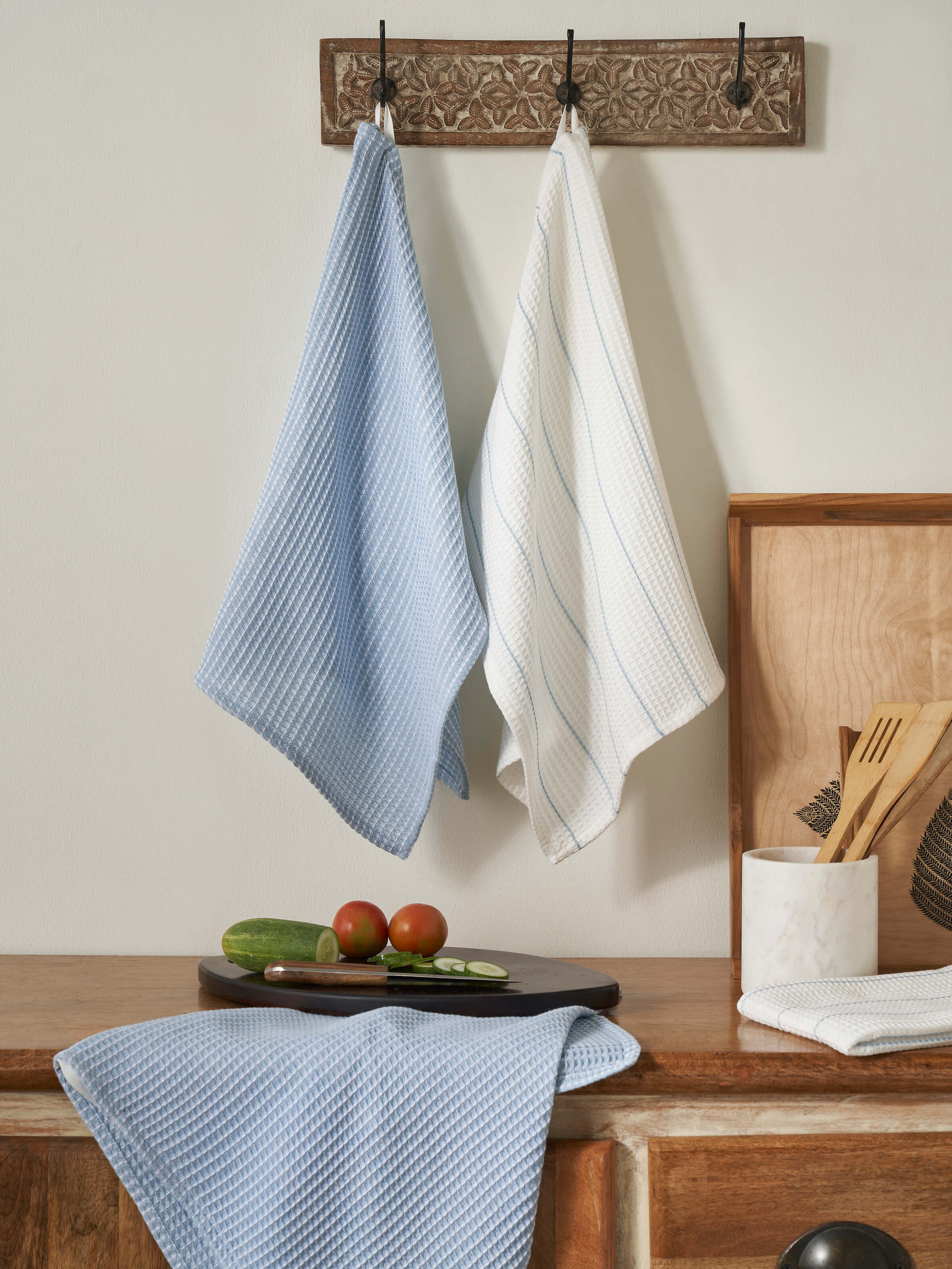Full view of Arth light blue handwoven cotton dish towels set of 4, emphasizing the light blue color and handwoven detail.