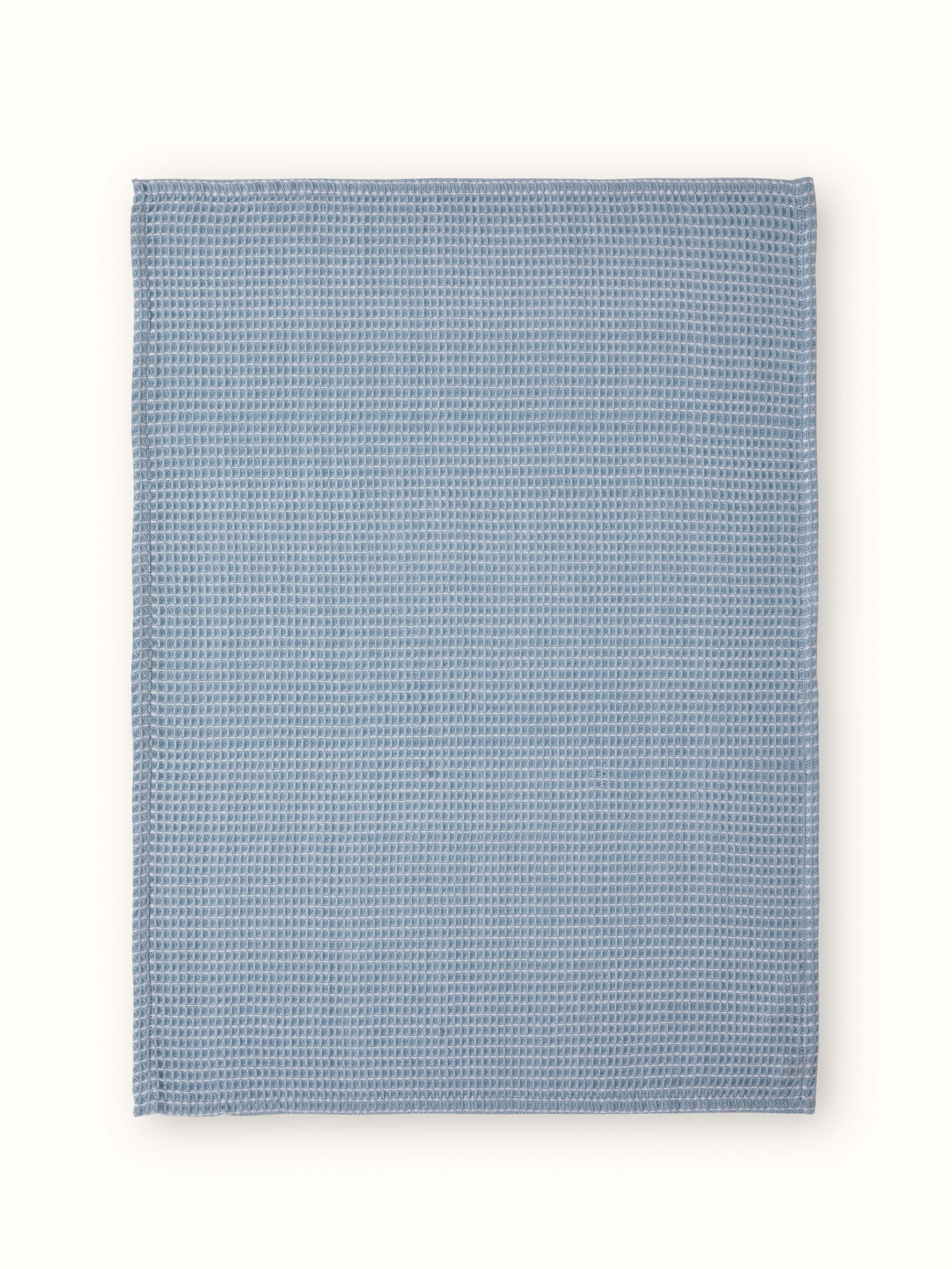 Close-up of Arth Light Blue Waffle Cotton Dish Towels (4 pcs) - Detailed view of waffle texture and light blue hue.