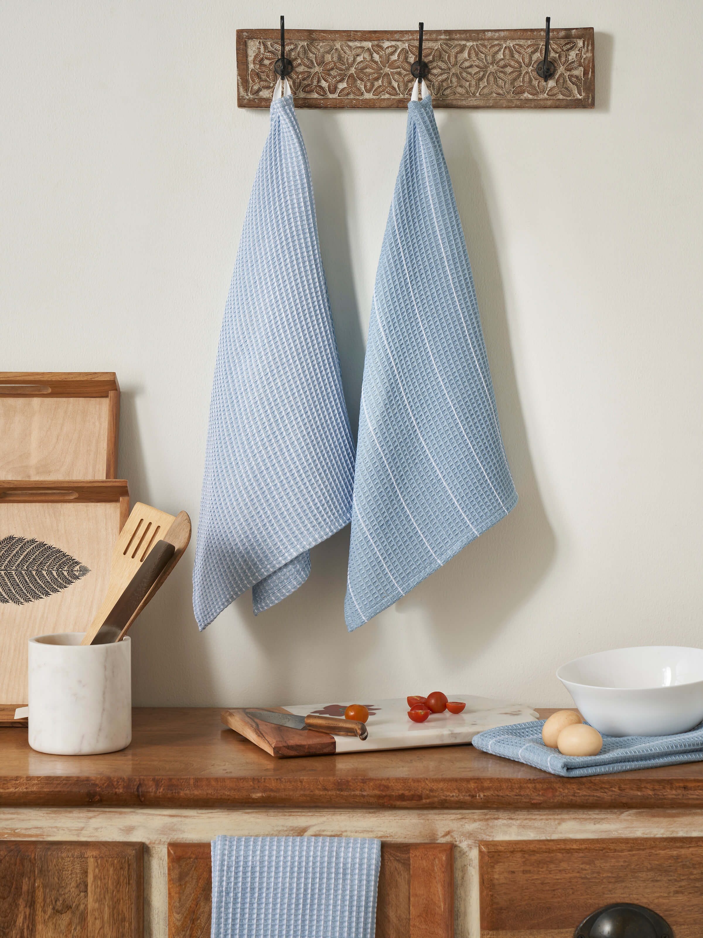 Arth Light Blue Waffle Cotton Dish Towels (4 pcs) - Folded dish towels displaying the waffle pattern and light blue color.