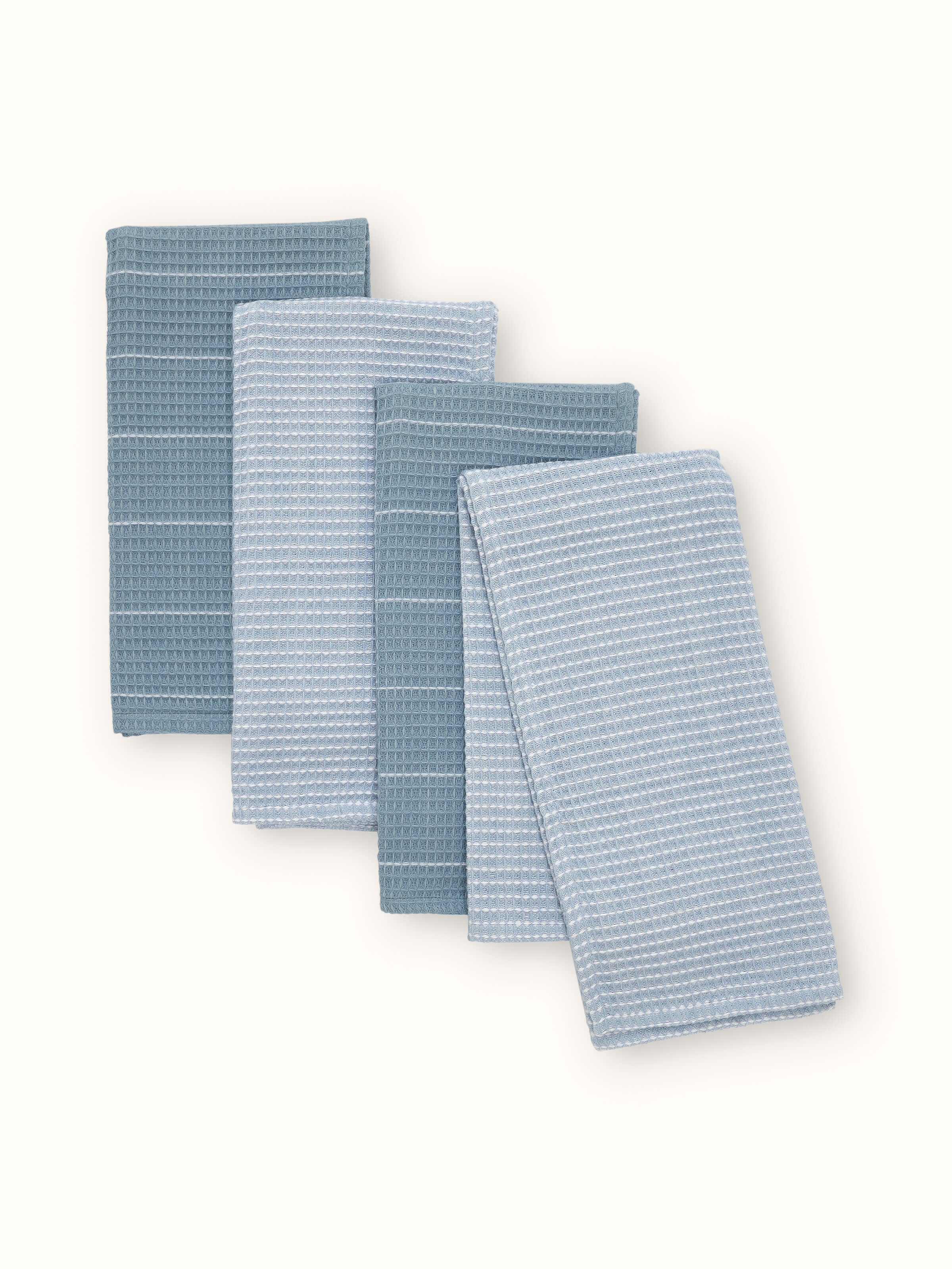 Arth Light Blue Waffle Cotton Dish Towels (4 pcs) - Light blue waffle weave dish towels in use, showing texture.