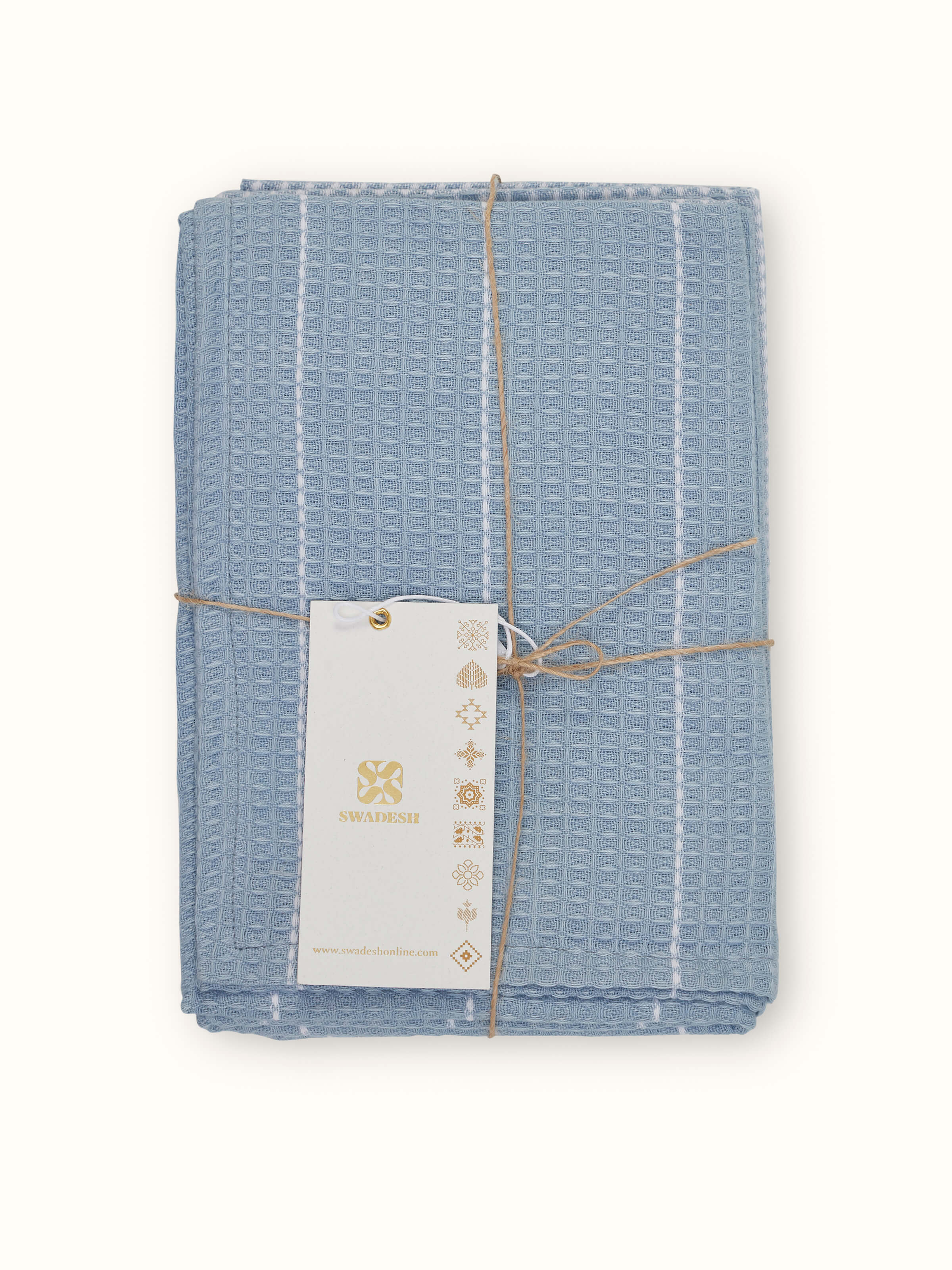 Arth Light Blue Waffle Cotton Dish Towels (4 pcs) - A stacked view of dish towels highlighting the waffle texture.