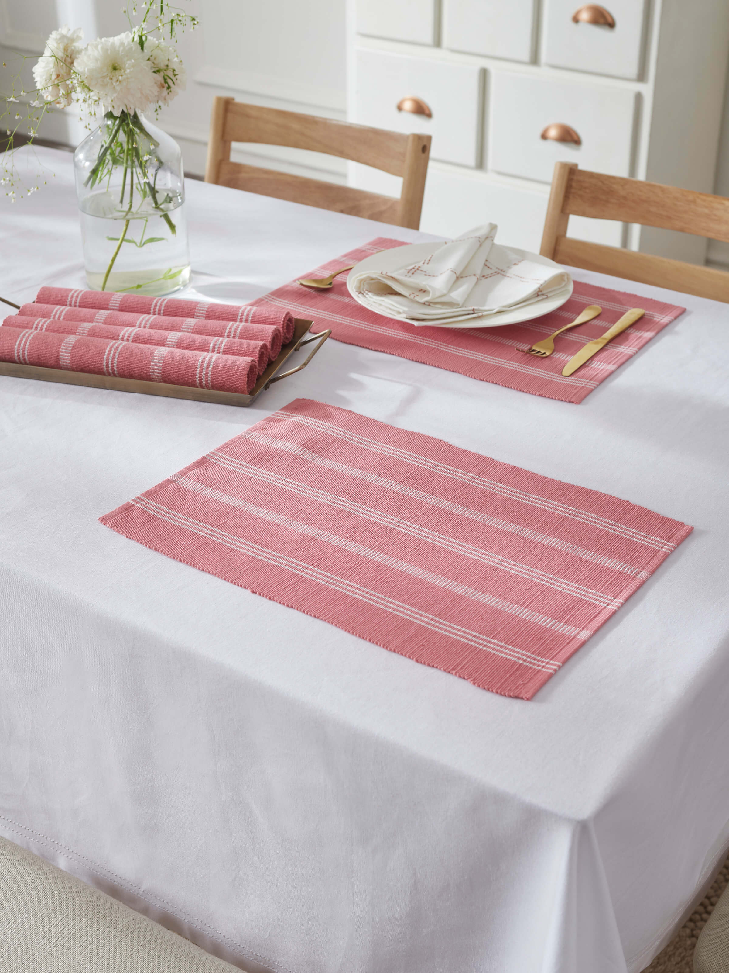 Vastav striped pink handloom cotton table mats styled on dining table