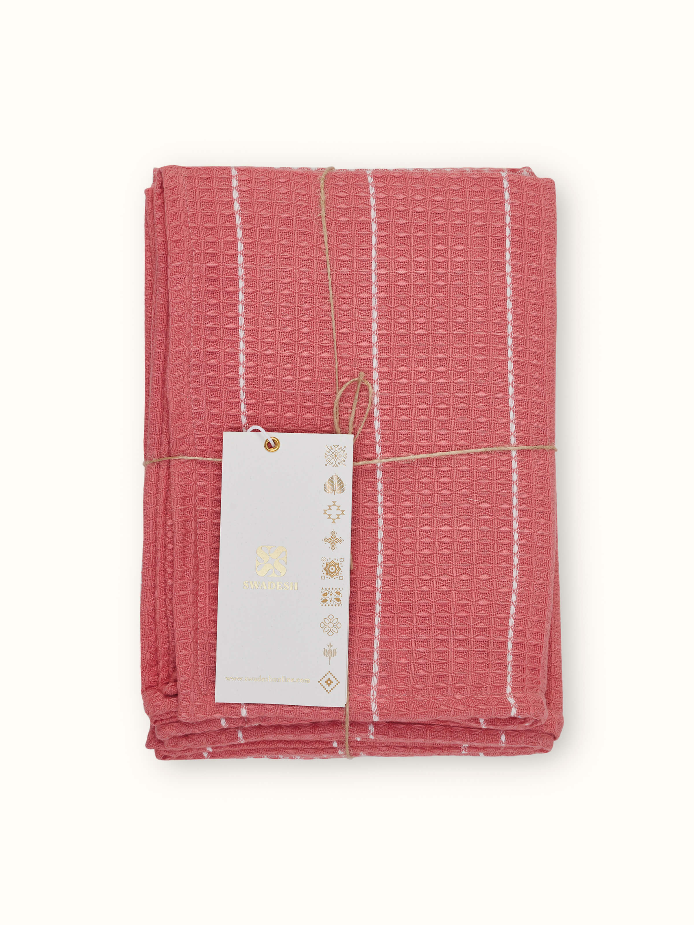 Side view of Arth pink handwoven cotton dish towels (4 pcs) emphasizing the thickness and texture of the towels.