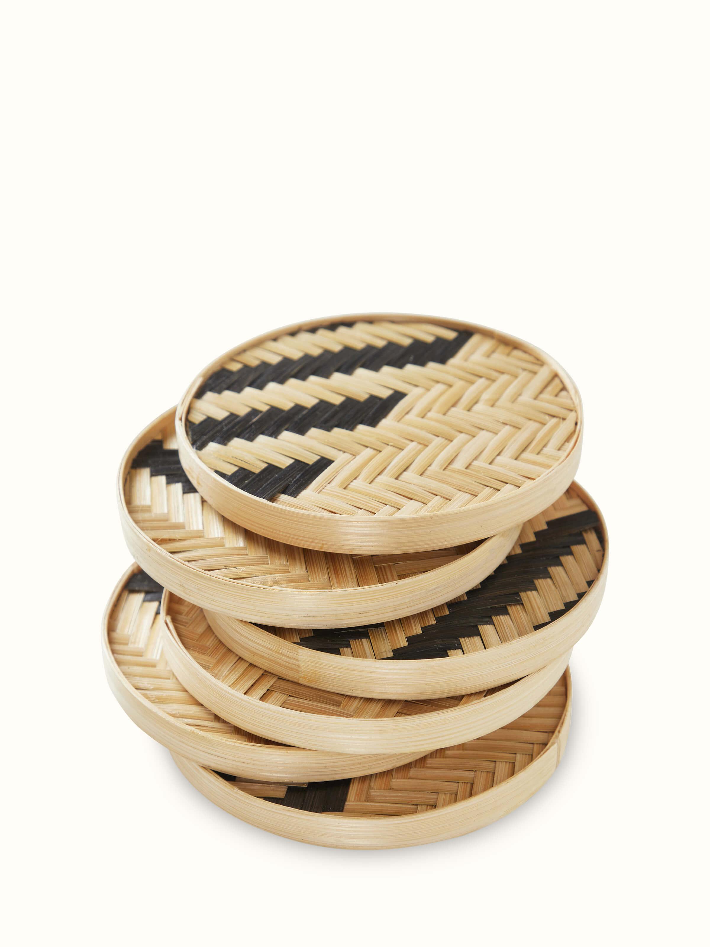 Detailed view of Naveena Grey Checks Round Natural Fibre Coasters, focusing on the intricate pattern and round shape.