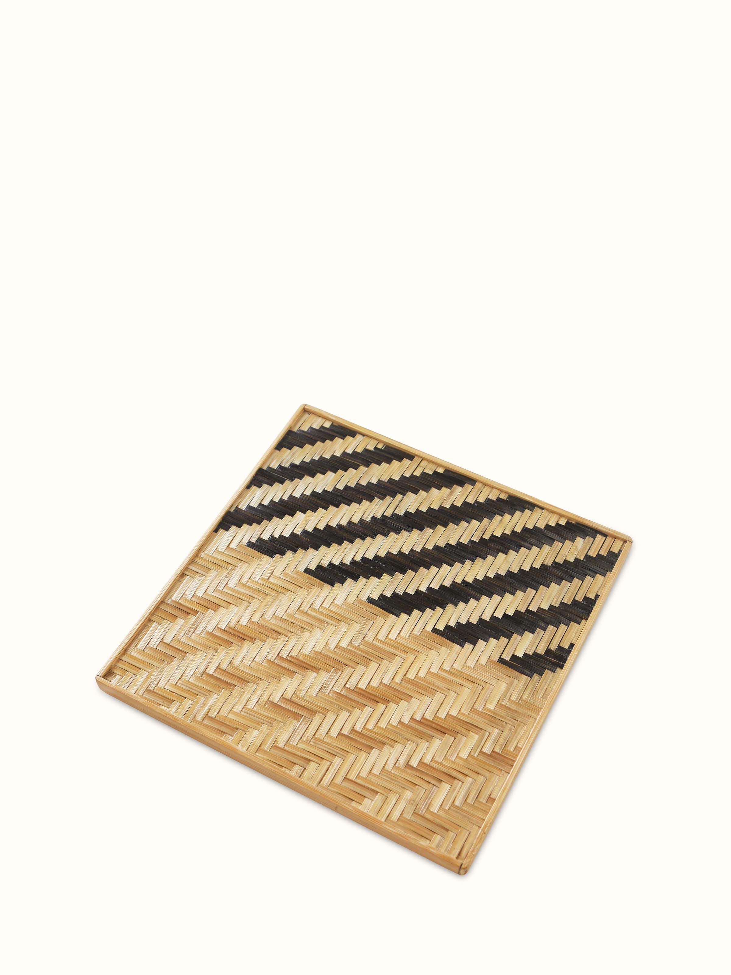 Detailed view of Naveena grey geometric square natural fibre trivets (2 pcs) showcasing the texture and geometric design