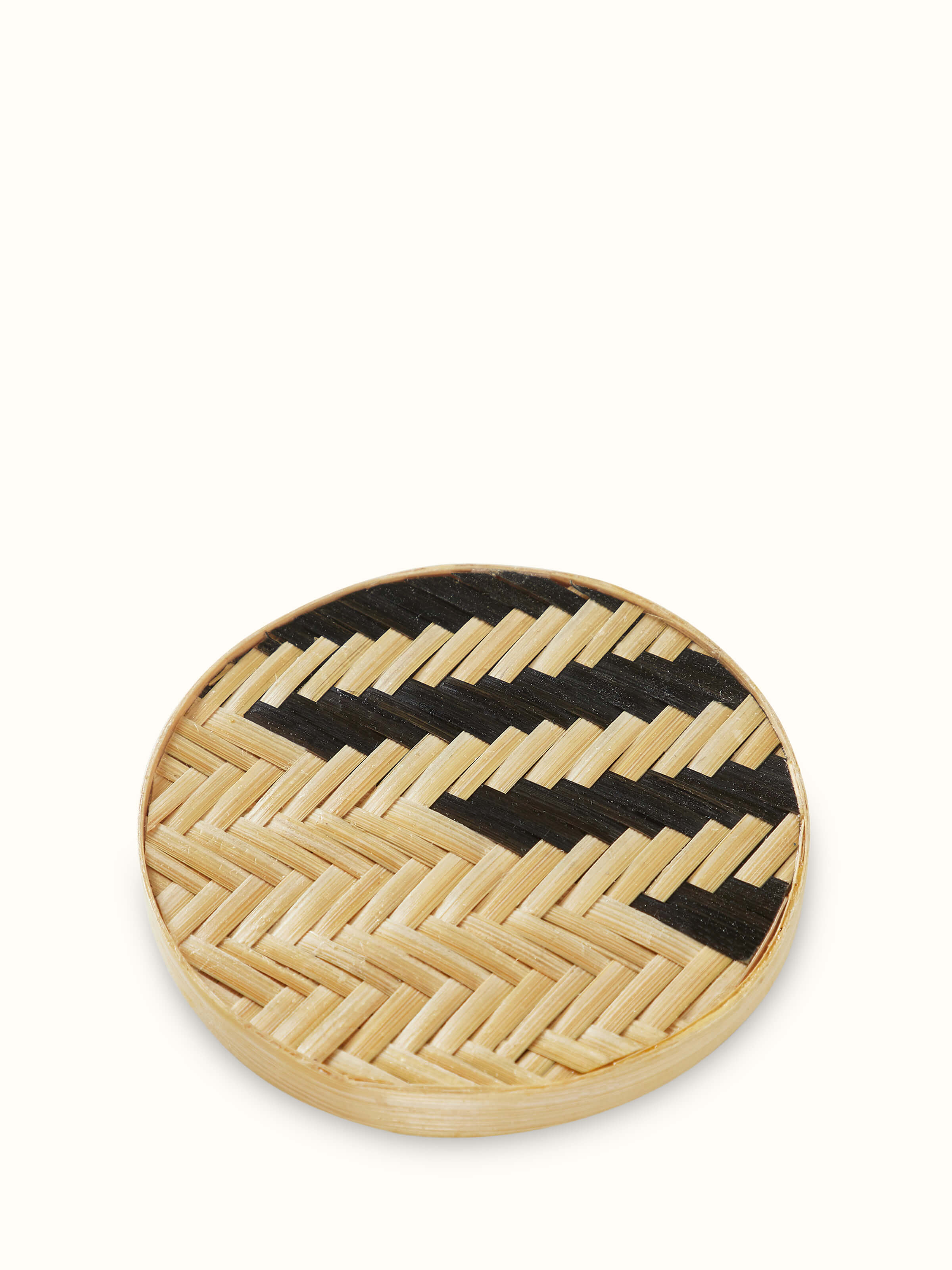 Side view of Naveena brown geometric round natural fibre coasters (6 pcs) showing the geometric design and natural texture.