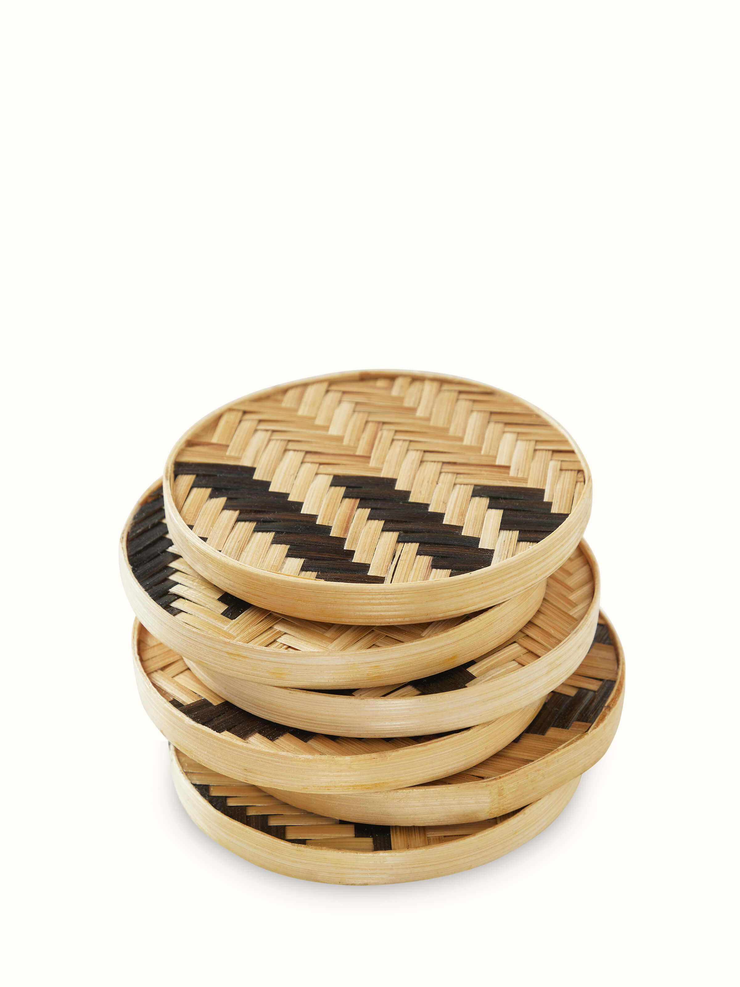 Folded view of Naveena brown geometric round natural fibre coasters (6 pcs) displaying the round shape and geometric design.