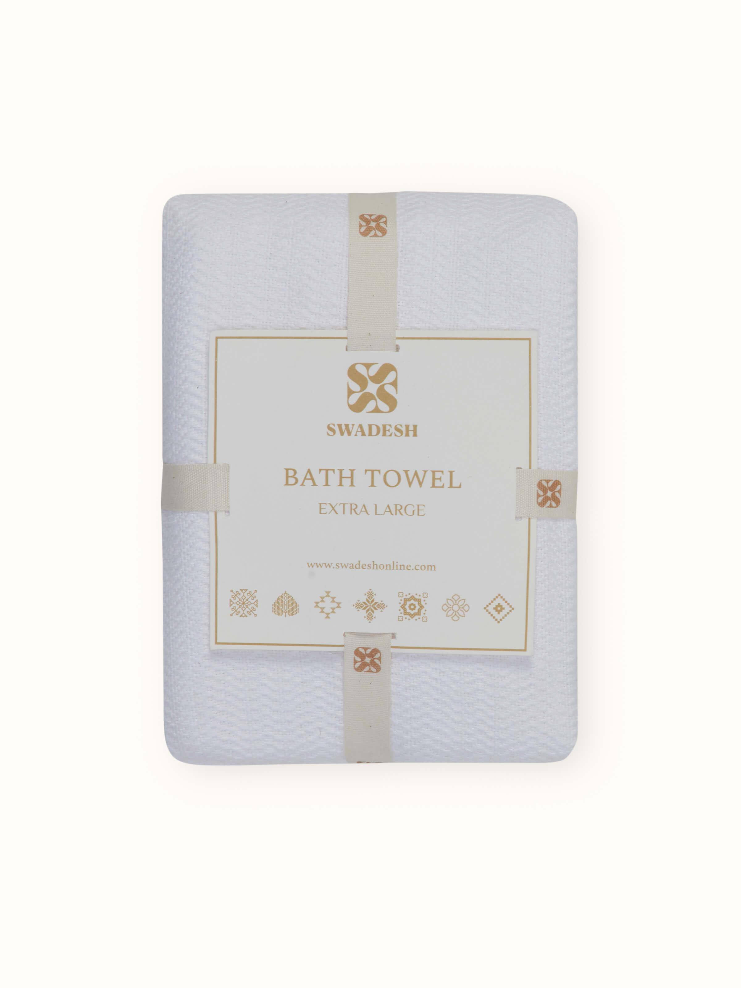 Perspective view of Vayana stripe white cotton bath towel (XL) capturing its large size and striped pattern.