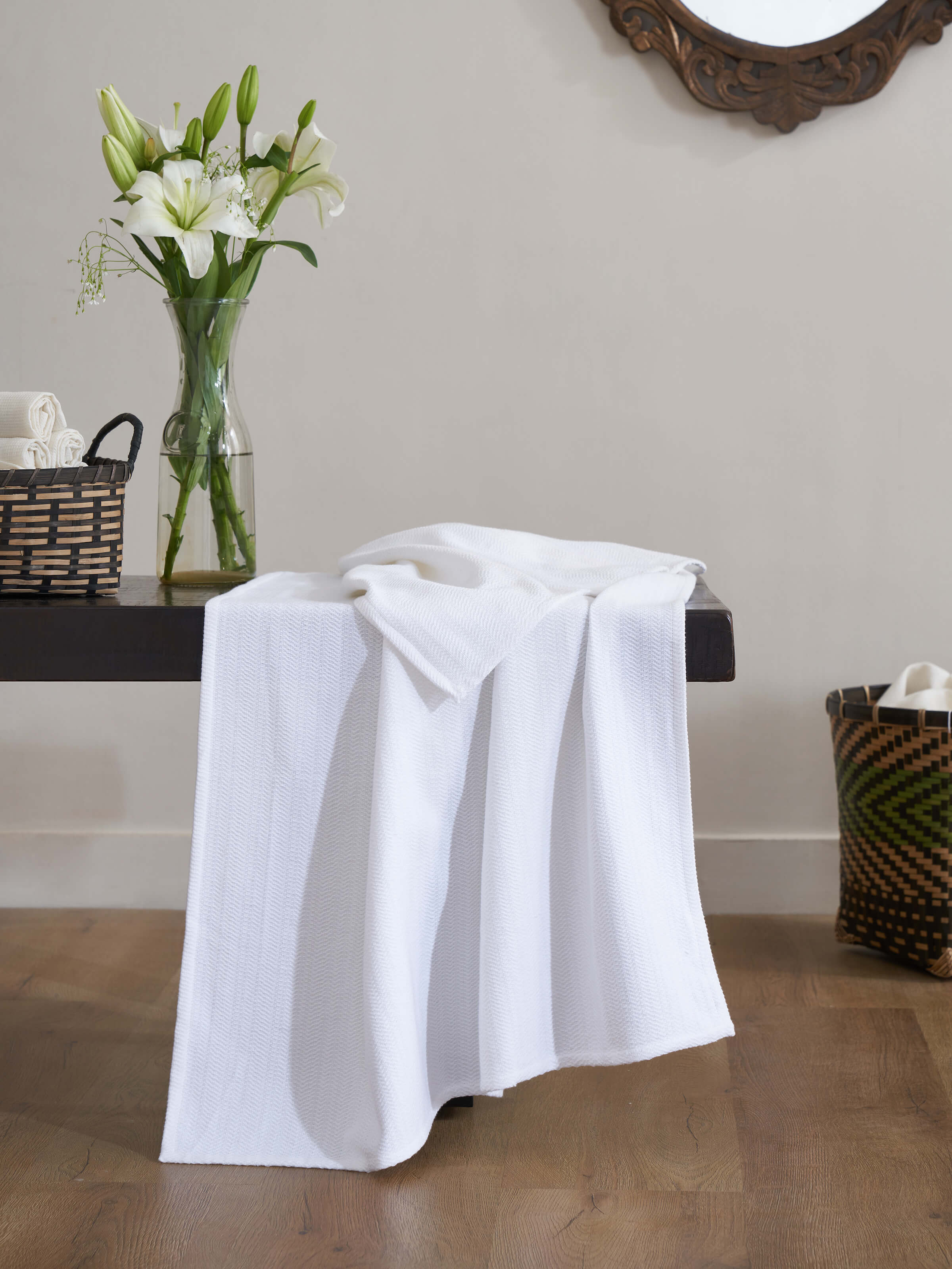 Close-up of Vayana stripe white cotton striped bath towel (L), highlighting the texture and stripe pattern