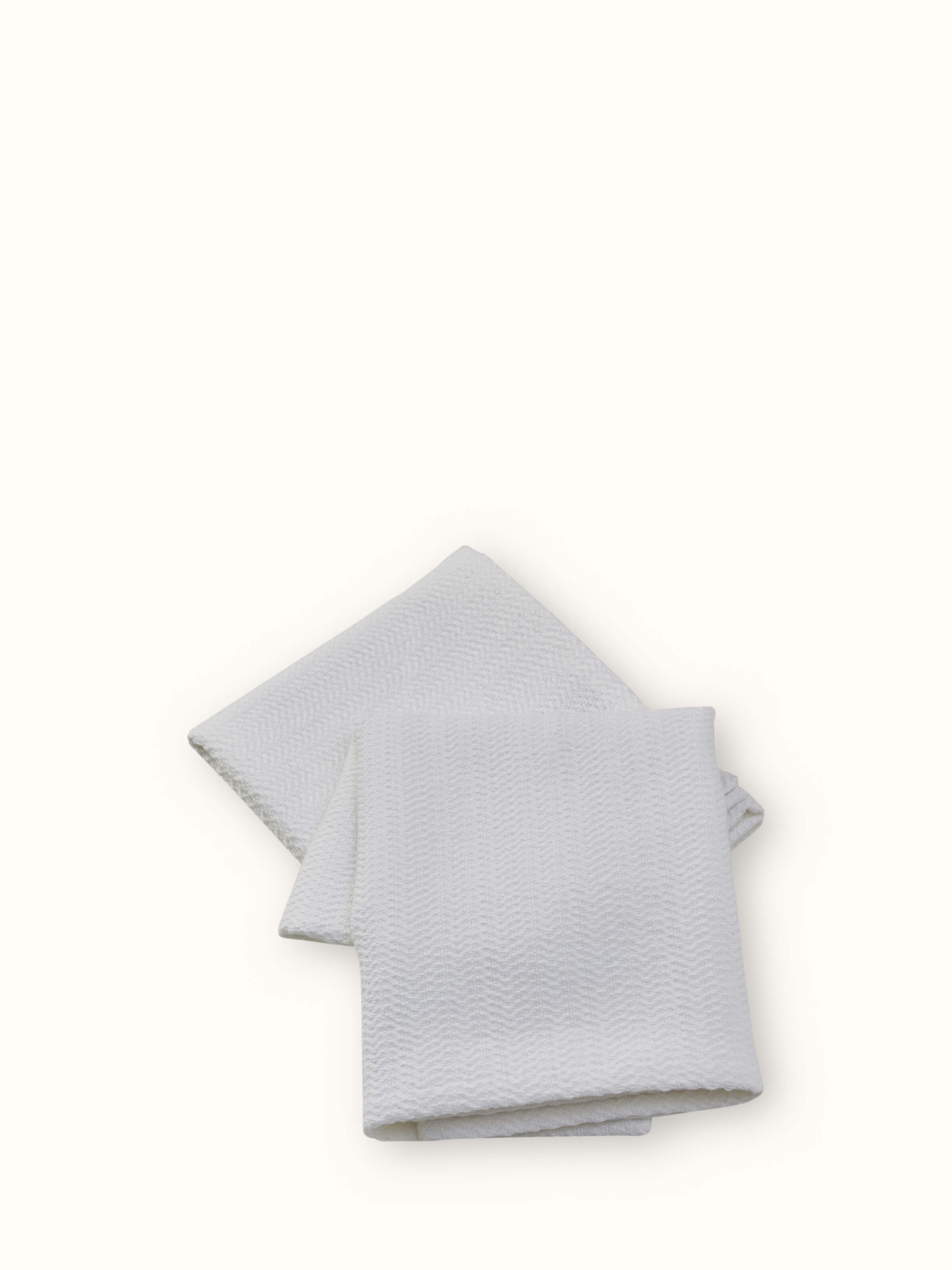 Angled view of Vayana stripe white cotton hand towels (2 pcs) displaying the stripe pattern and texture