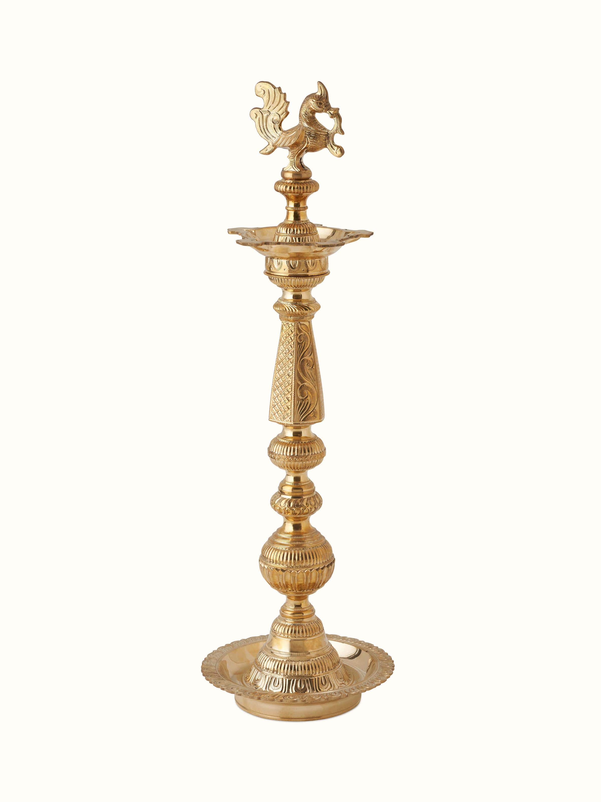 Front view of Polished brass vilakku stand diya featuring its elegant brass finish and traditional design