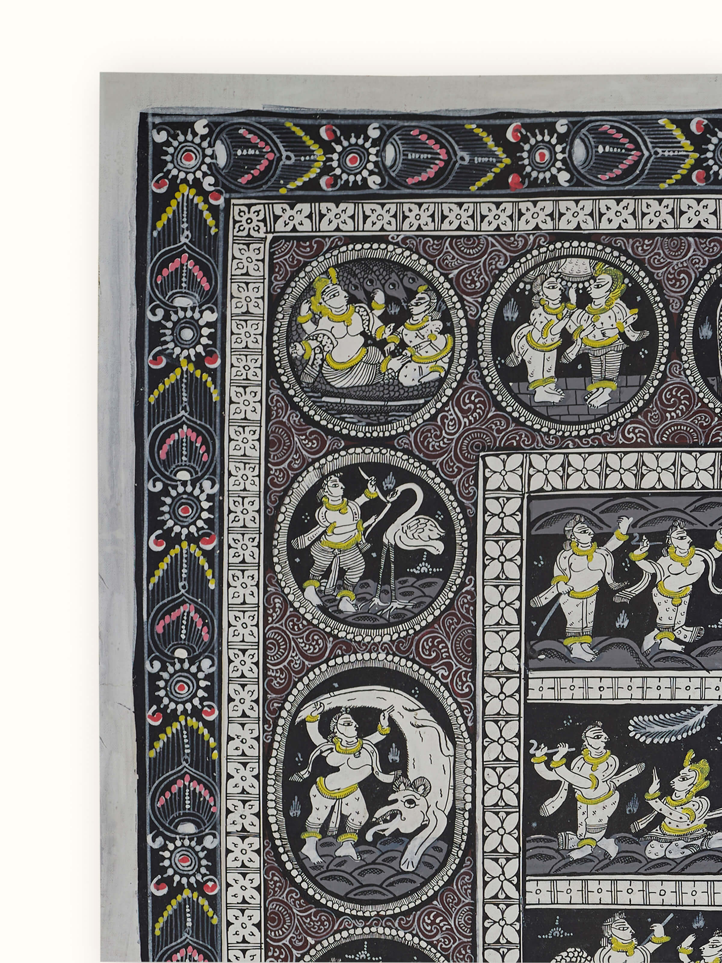 Side view of Pattachitra Krishna narrative painting showing the intricate patterns and rich colors.