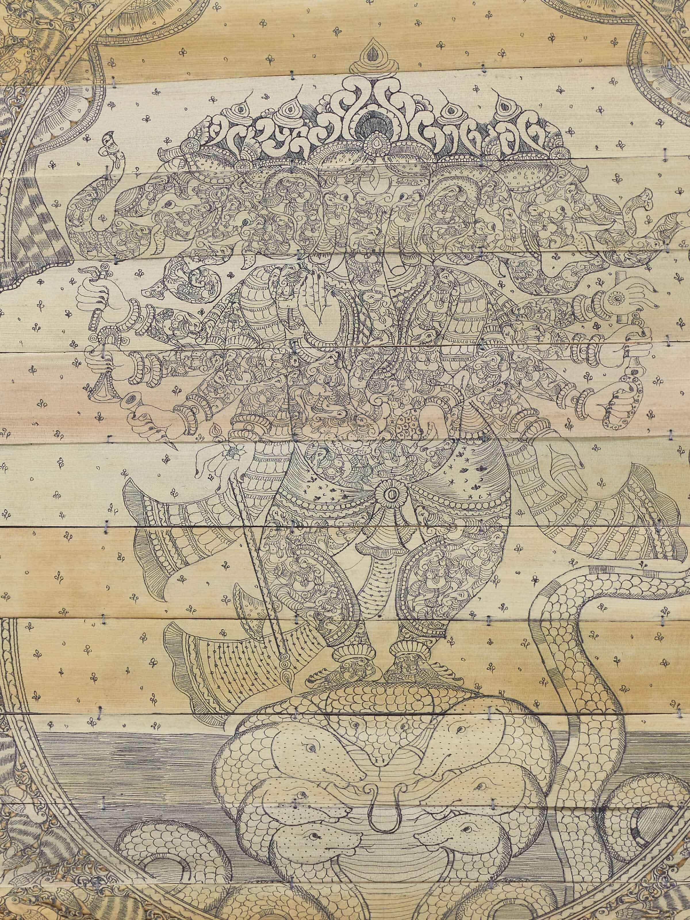 Angled view of Palm Leaf Engraved Vakratunda Ganesha Wall Art, focusing on intricate engraving and spiritual themes.